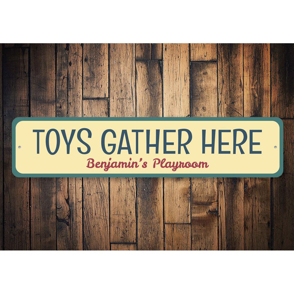 A colorful Toys Gather Here Sign made of aluminum, featuring playful designs suitable for children's rooms.