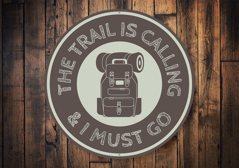 Trail is Calling Sign made of high-quality aluminum, featuring a rustic design perfect for home decor.