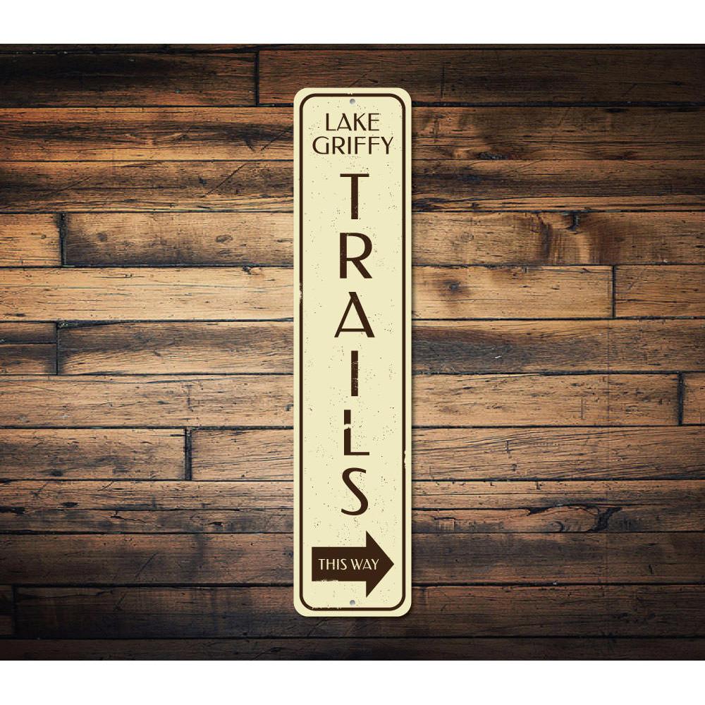 Trails This Way Vertical Sign made of high-quality aluminum, featuring a rustic design perfect for lakehouse decor.