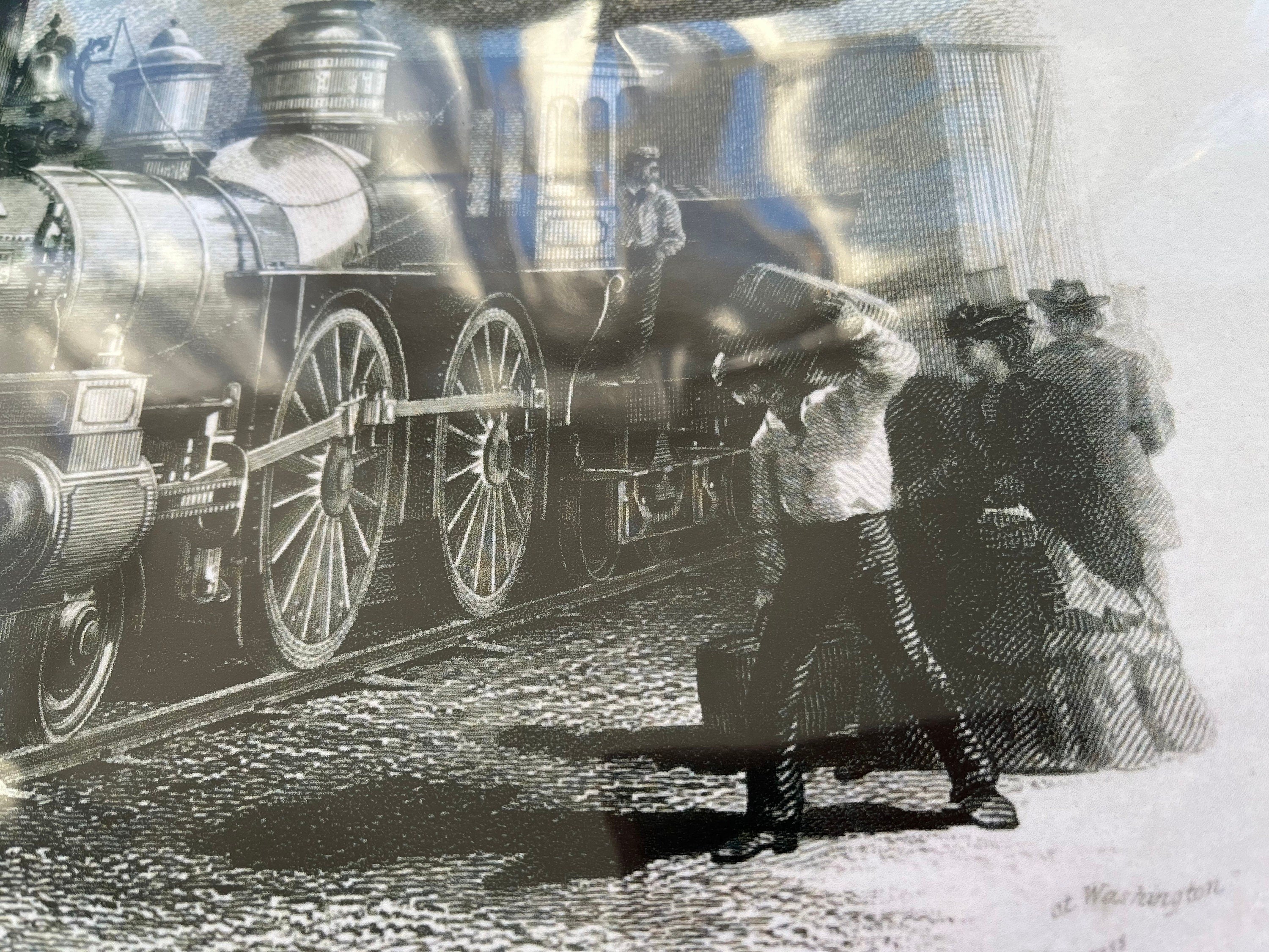 A classic black and white print of a train locomotive in action, showcasing vintage rail travel.