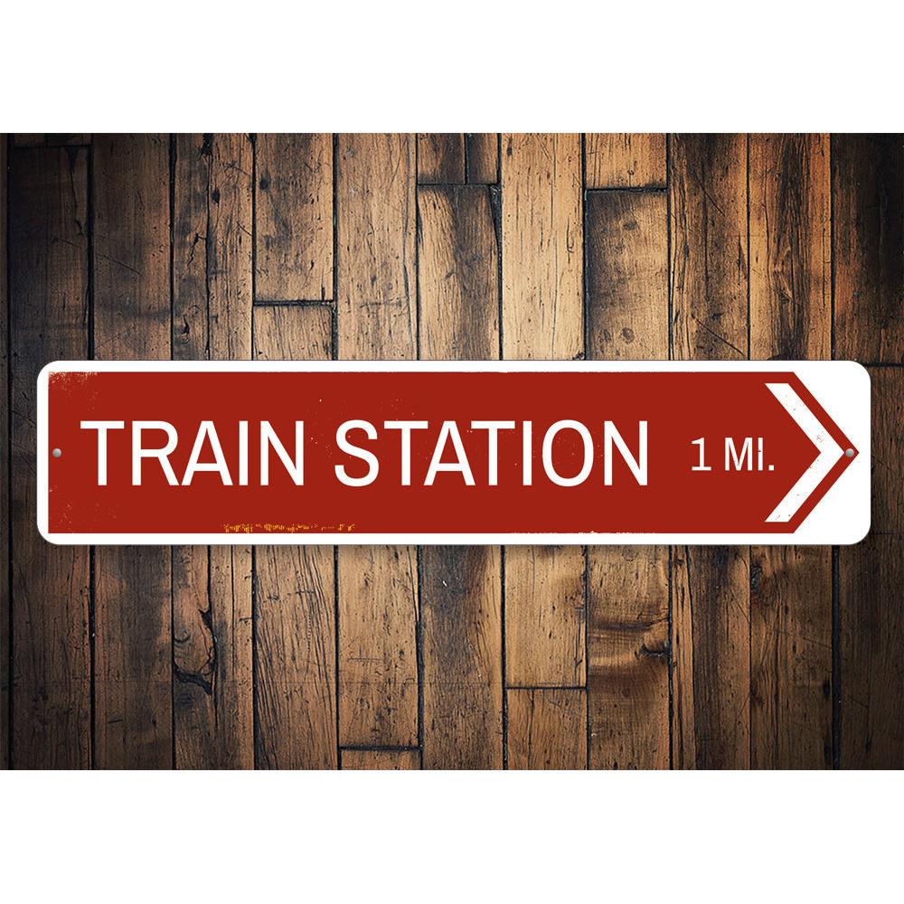 Train Station Arrow Sign made of high-quality aluminum, featuring customizable text and pre-drilled holes for easy mounting.