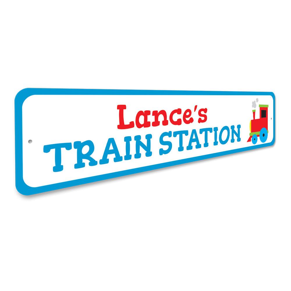 Colorful Train Station Kids Room Sign made of aluminum, featuring a playful design perfect for children's room decor.