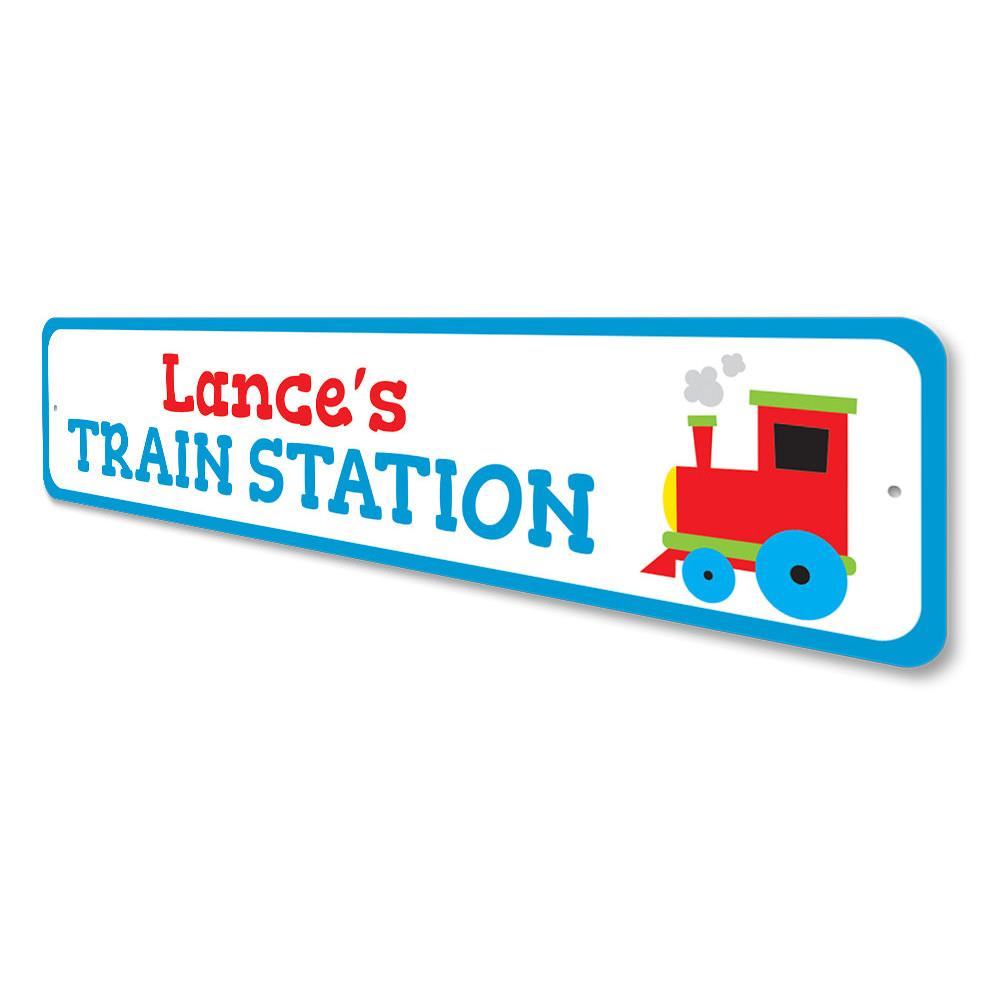 Colorful Train Station Kids Room Sign made of aluminum, featuring a playful design perfect for children's room decor.