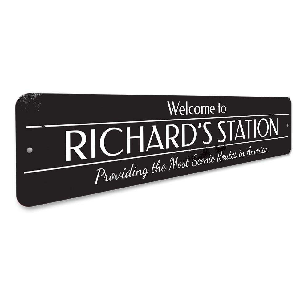 A decorative Train Station Welcome Sign made of high-quality aluminum, featuring customizable text options for a personal touch.