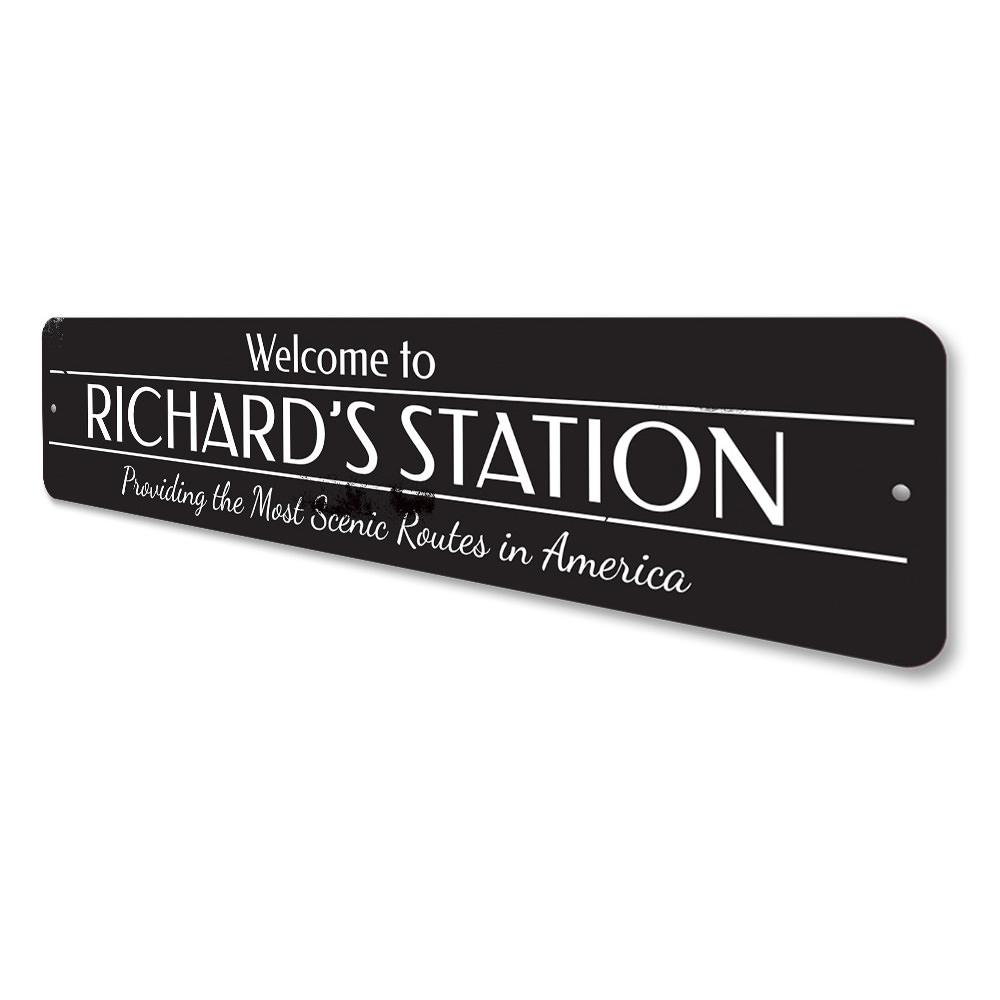 A decorative Train Station Welcome Sign made of high-quality aluminum, featuring customizable text options for a personal touch.