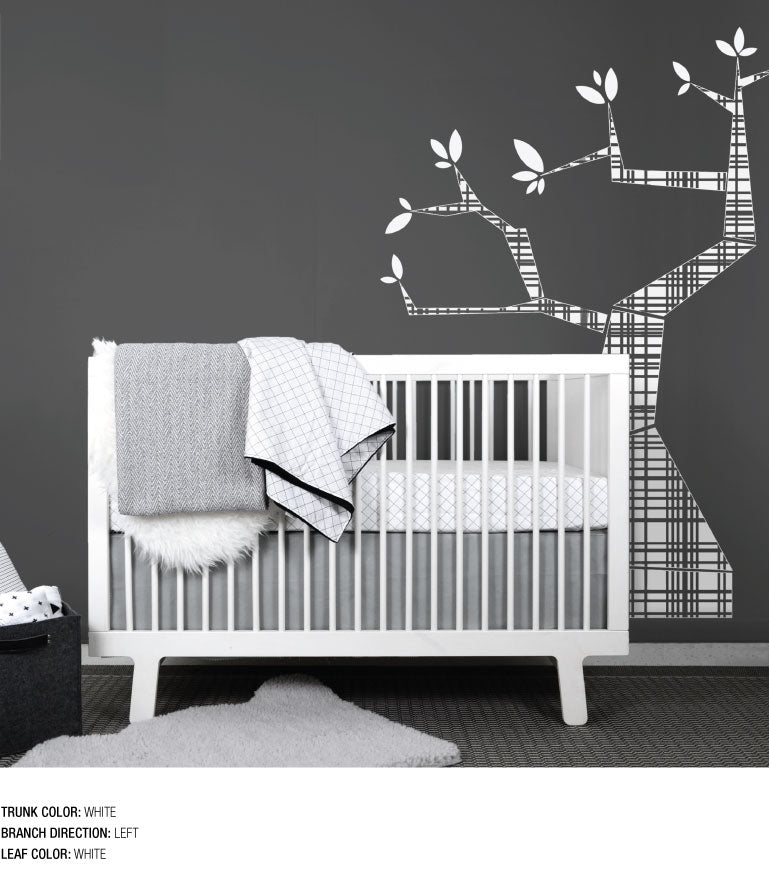 A beautifully designed Tree Wall Decal featuring a customizable trunk and leaves, perfect for nursery decor.