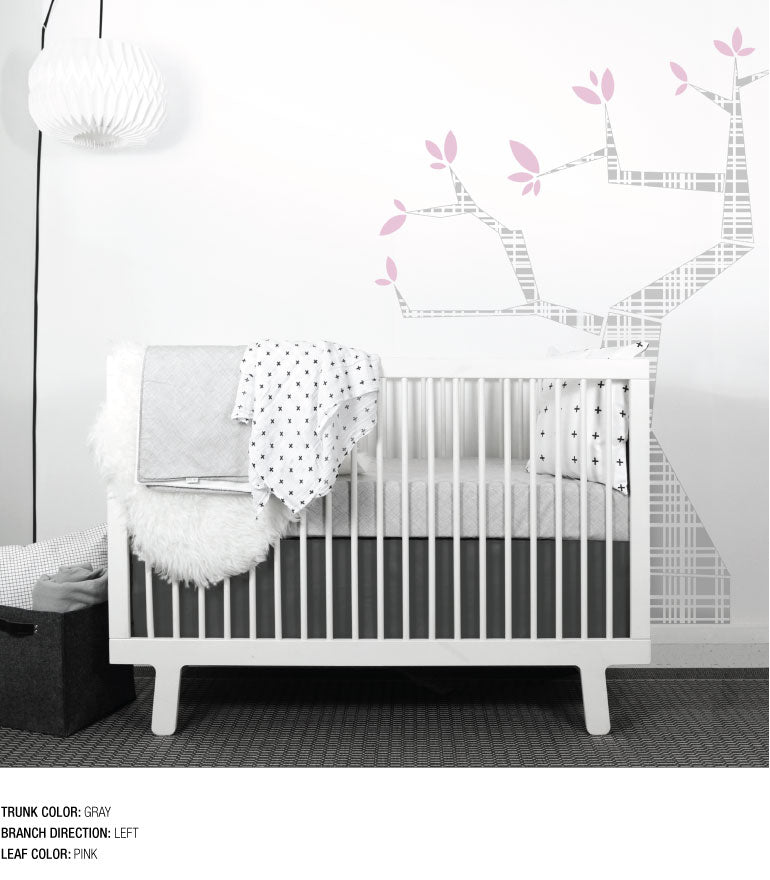 A beautifully designed Tree Wall Decal featuring a customizable trunk and leaves, perfect for nursery decor.