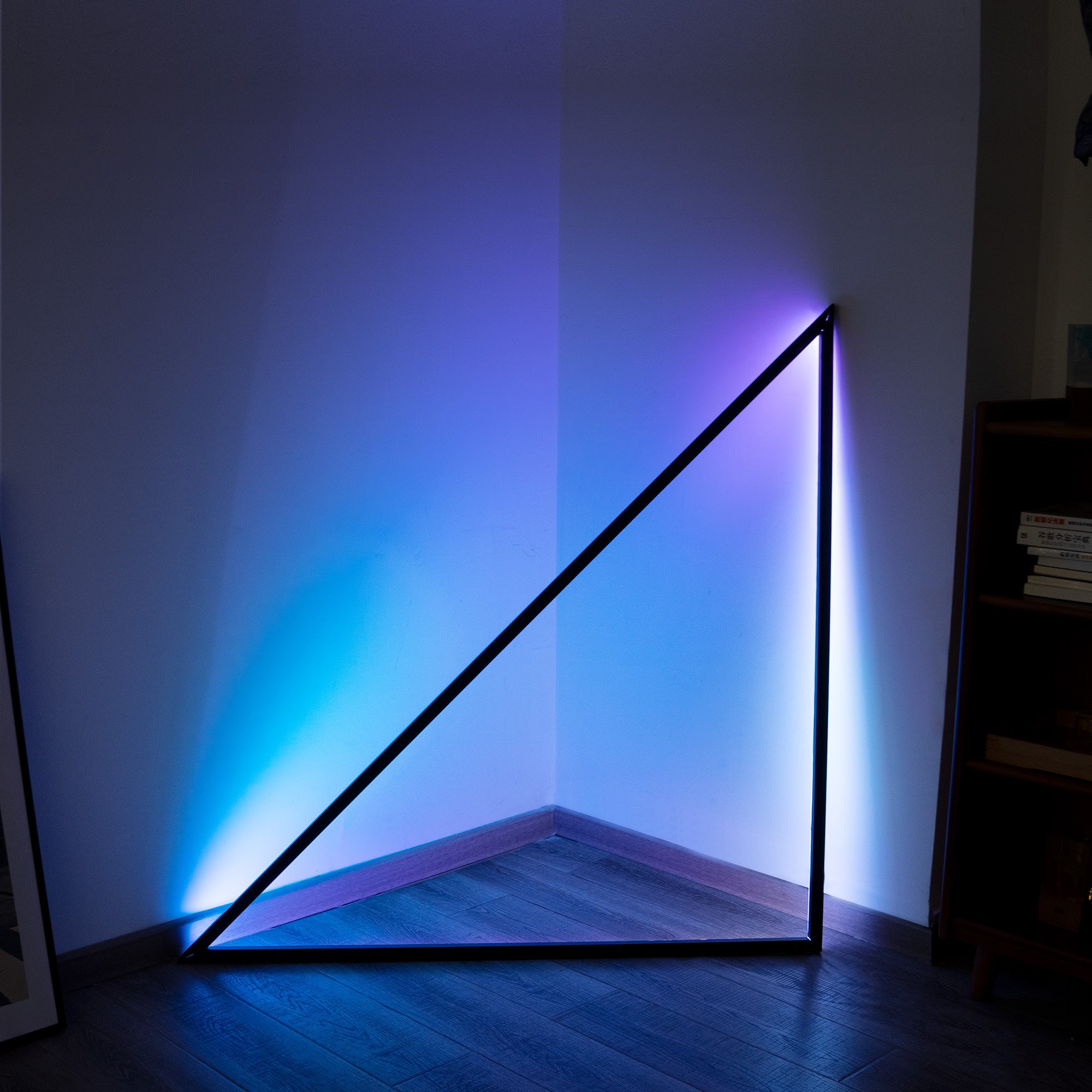 Triangle Music Sync Light in a modern setting, showcasing its sleek design and vibrant color options.