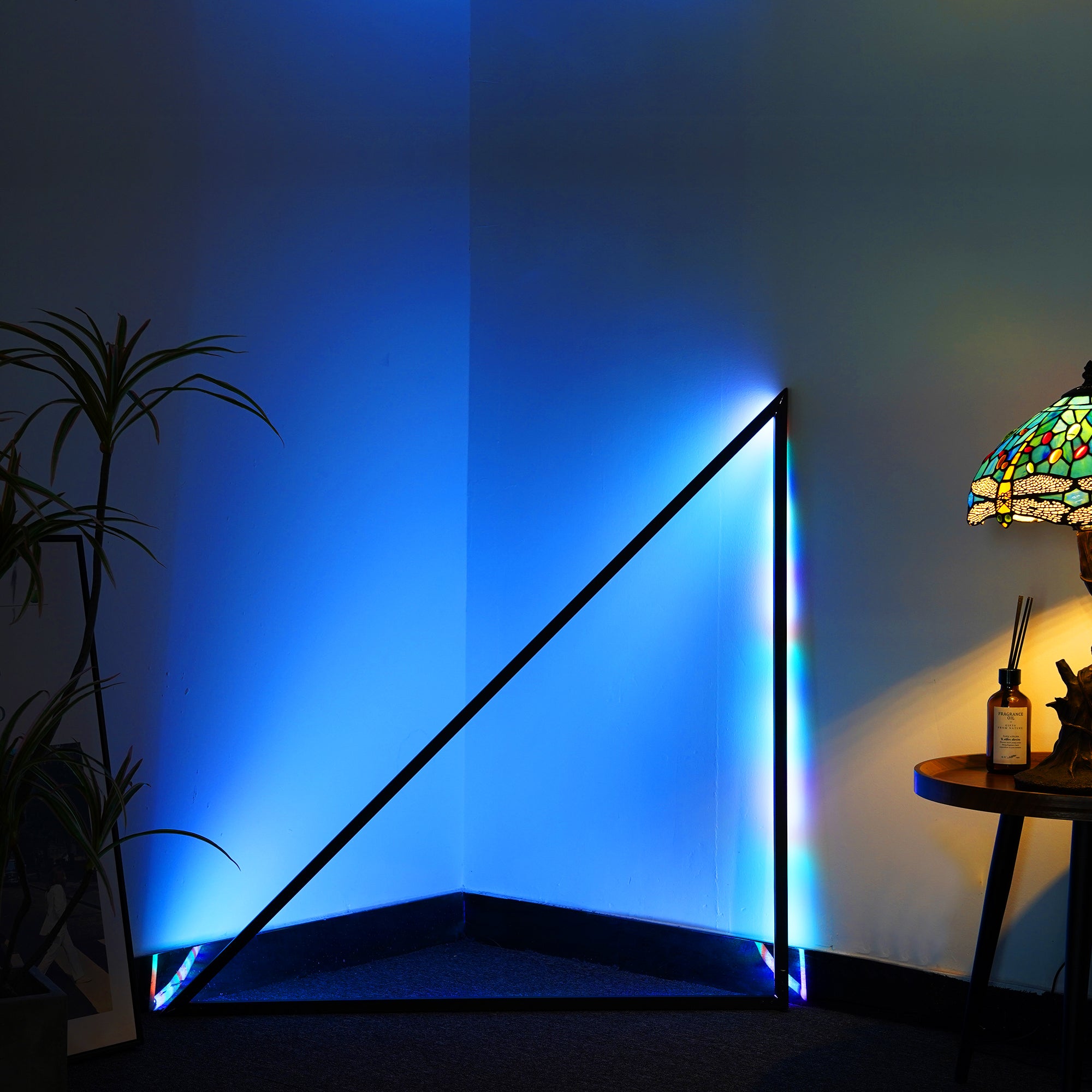 Triangle Music Sync Light in a modern setting, showcasing its sleek design and vibrant color options.