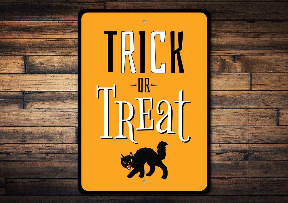 Trick or Treat Black Cat Sign featuring a spooky black cat design, perfect for Halloween decorations.