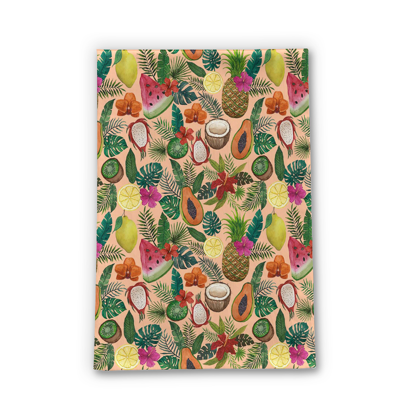 A colorful tea towel featuring tropical fruits and flowers, made of cotton twill, perfect for kitchen use.