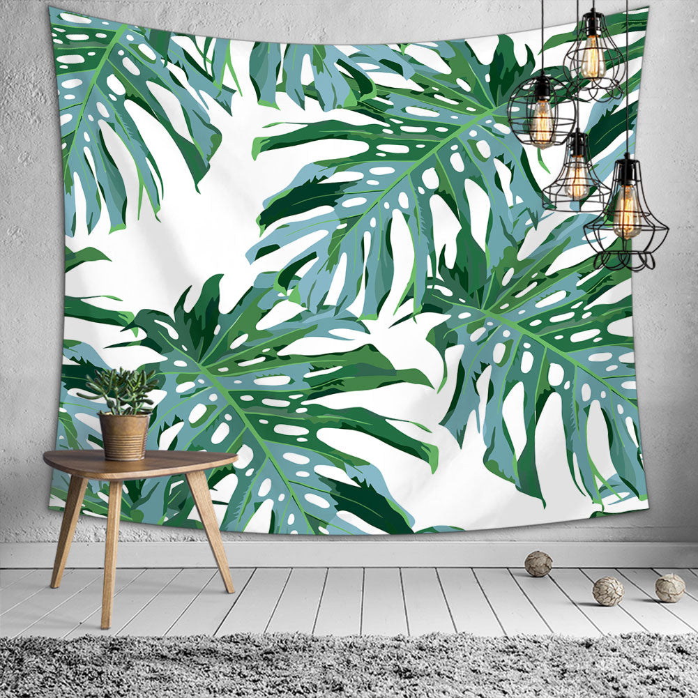 A vibrant Tropical Palm Leaf Tapestry featuring lush green palm leaves on a soft polyester fabric, perfect for boho decor.