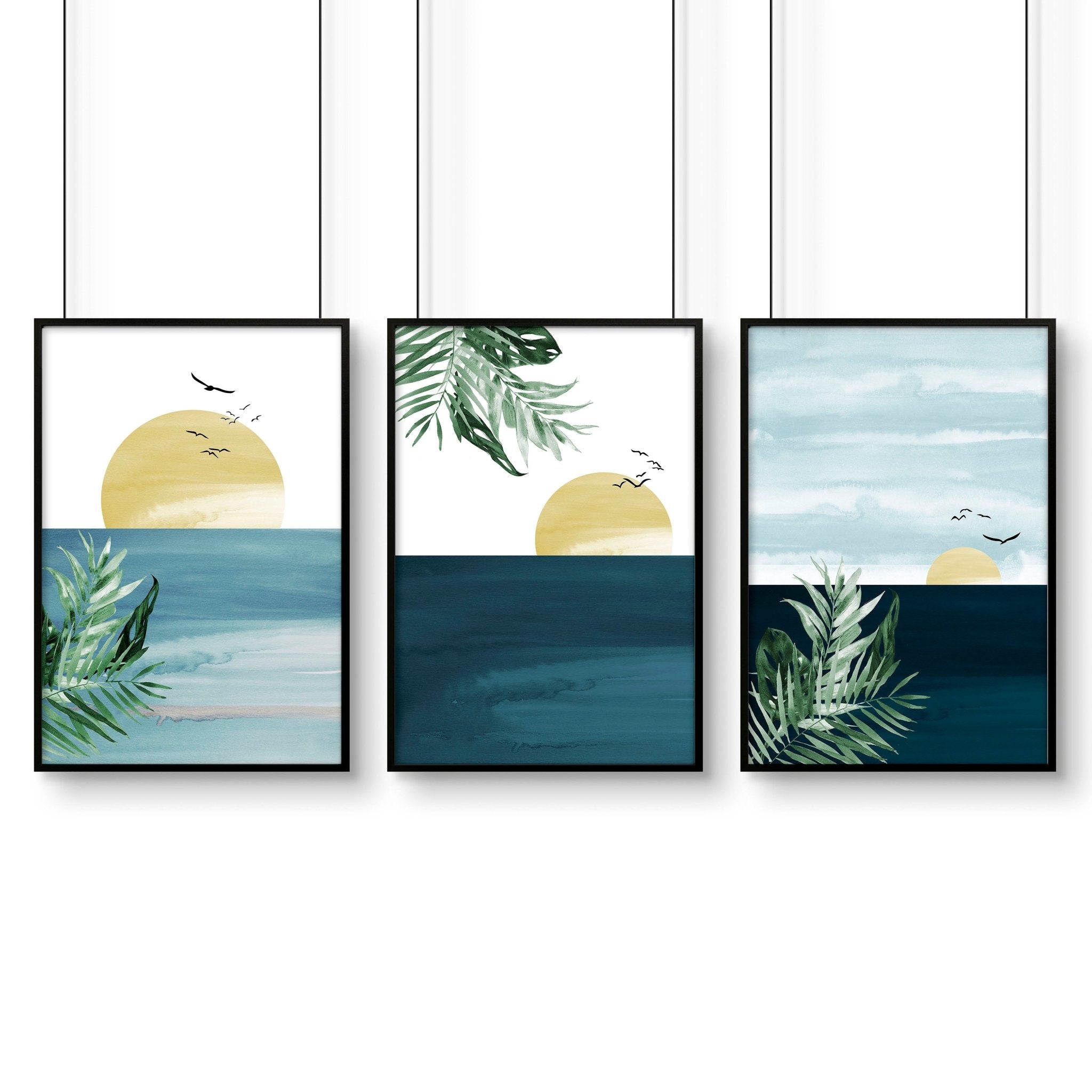 Set of 3 Tropical wall art prints featuring coastal designs in soothing blues and neutrals, perfect for home decor.