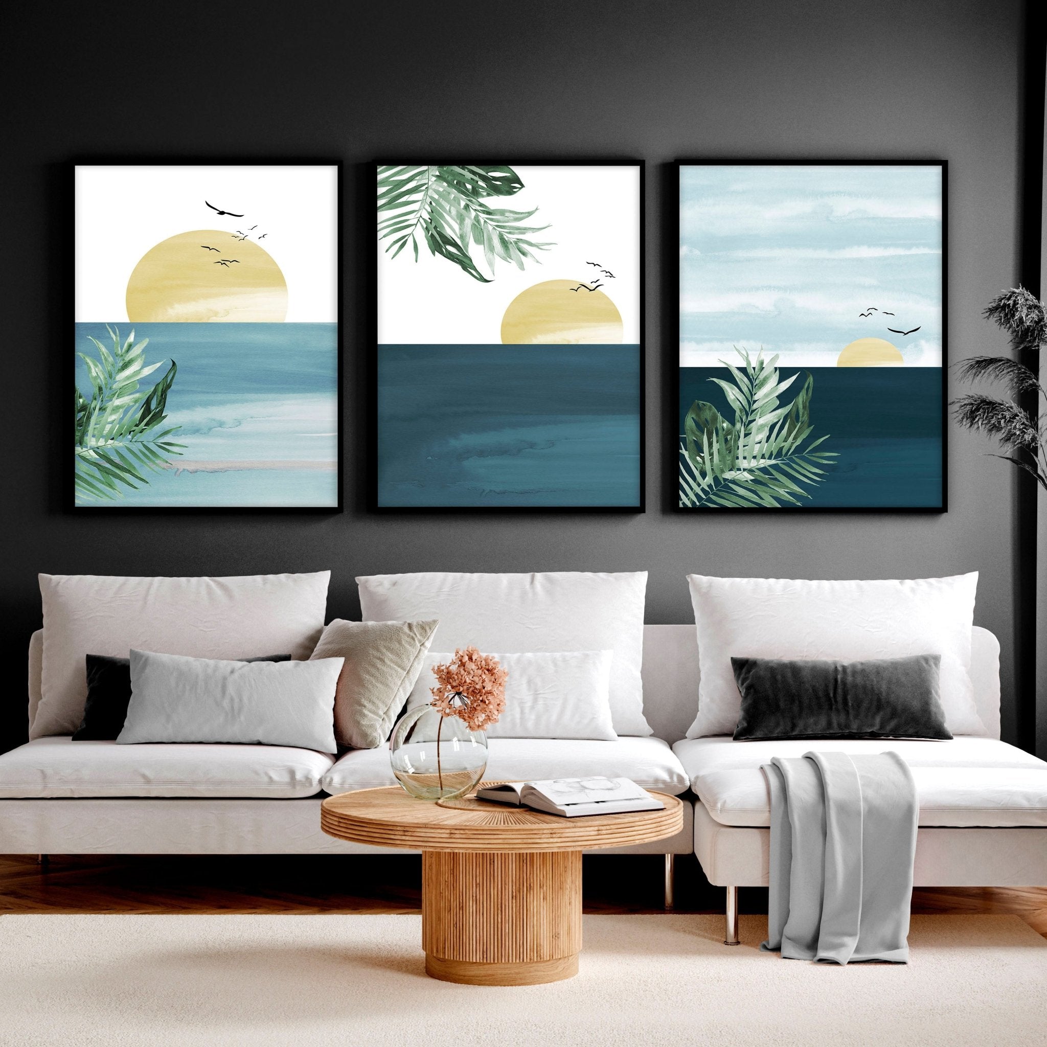 Set of 3 Tropical wall art prints featuring coastal designs in soothing blues and neutrals, perfect for home decor.