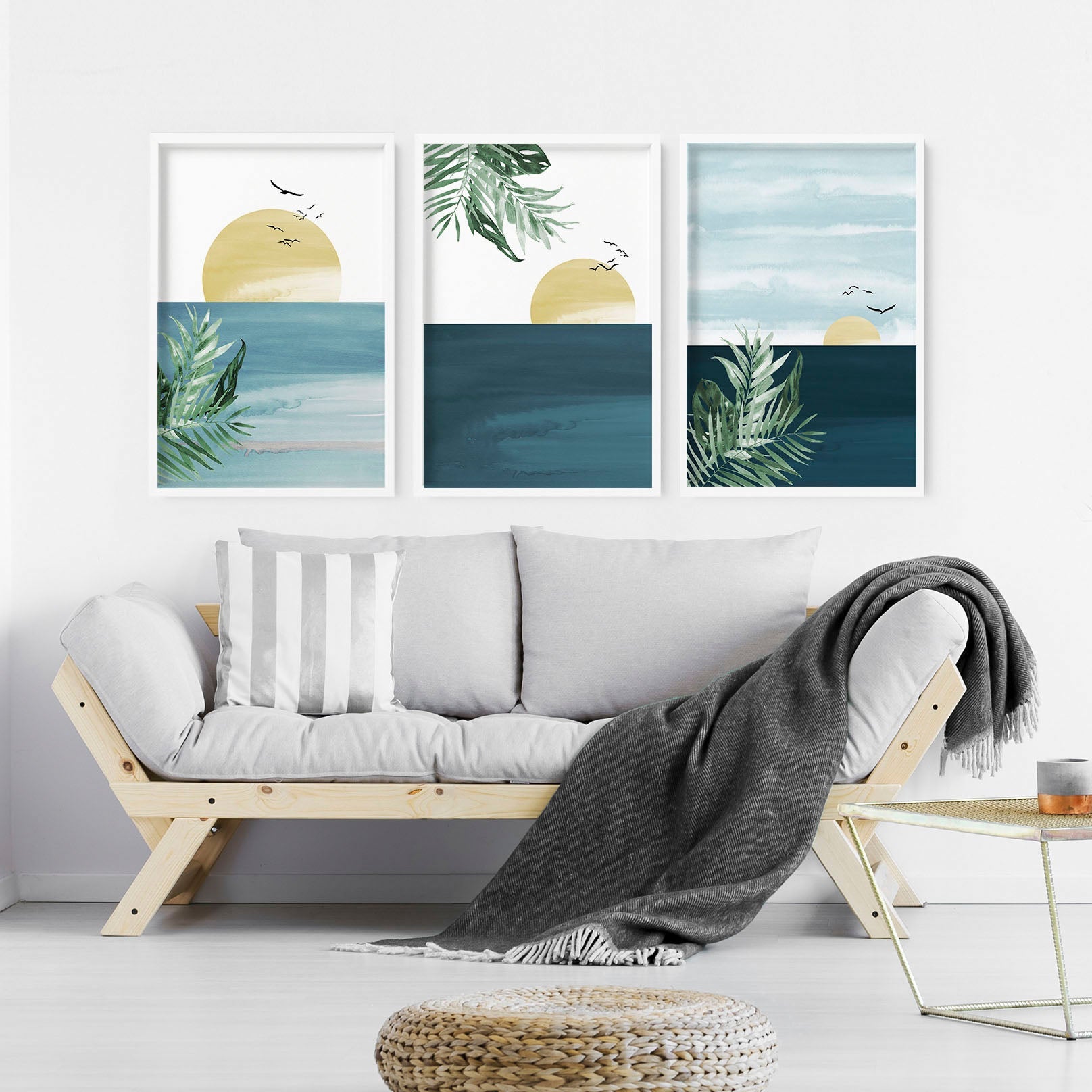 Set of 3 Tropical wall art prints featuring coastal designs in soothing blues and neutrals, perfect for home decor.