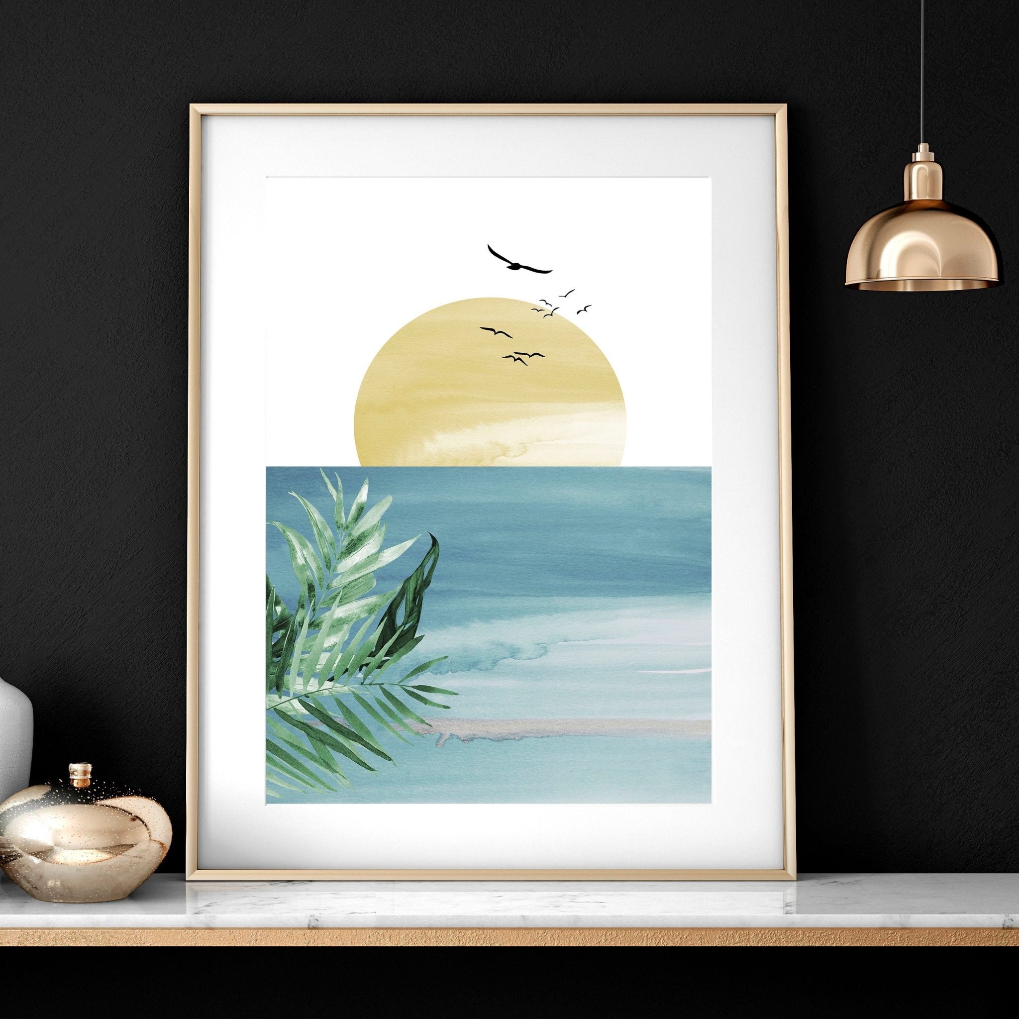 Set of 3 Tropical wall art prints featuring coastal designs in soothing blues and neutrals, perfect for home decor.