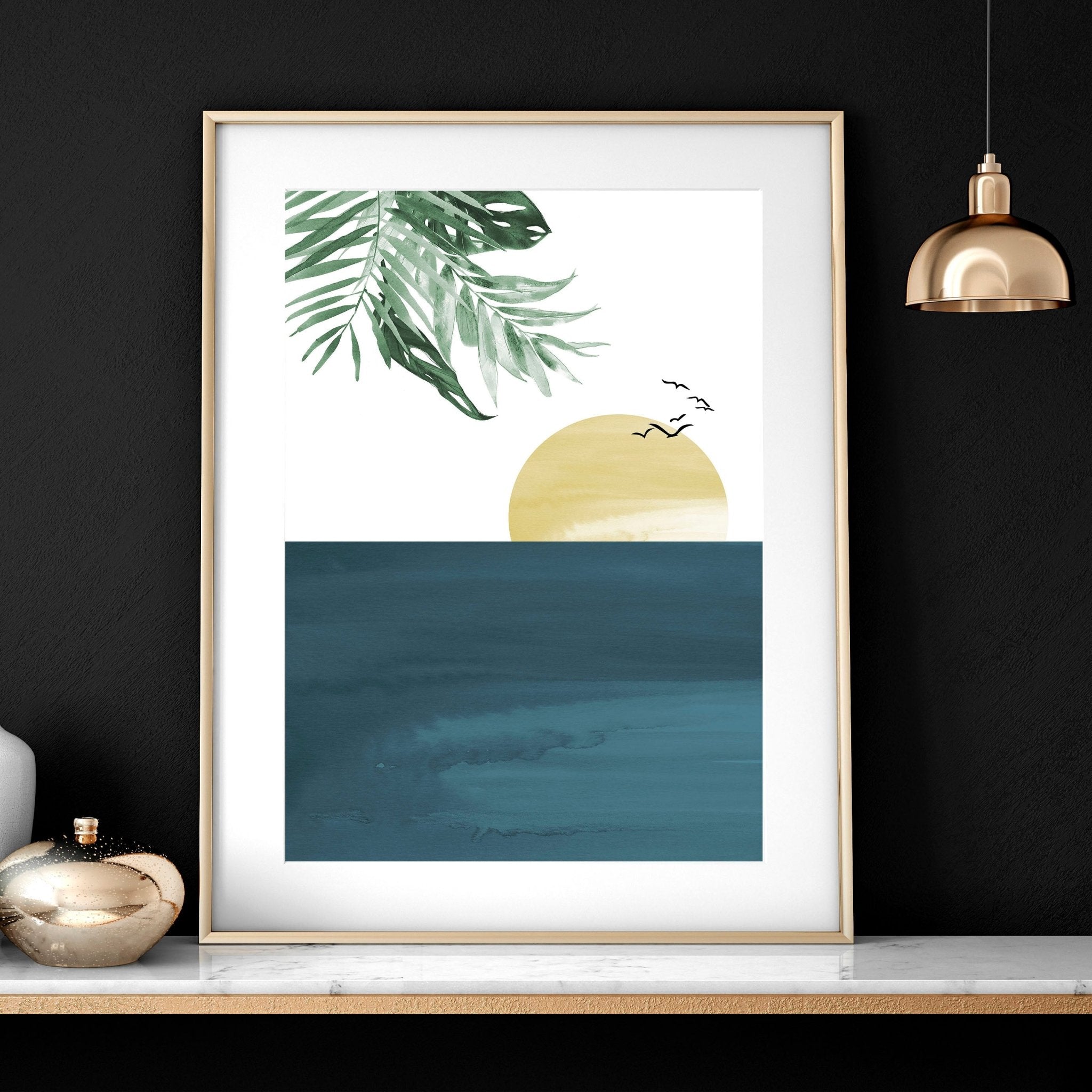 Set of 3 Tropical wall art prints featuring coastal designs in soothing blues and neutrals, perfect for home decor.