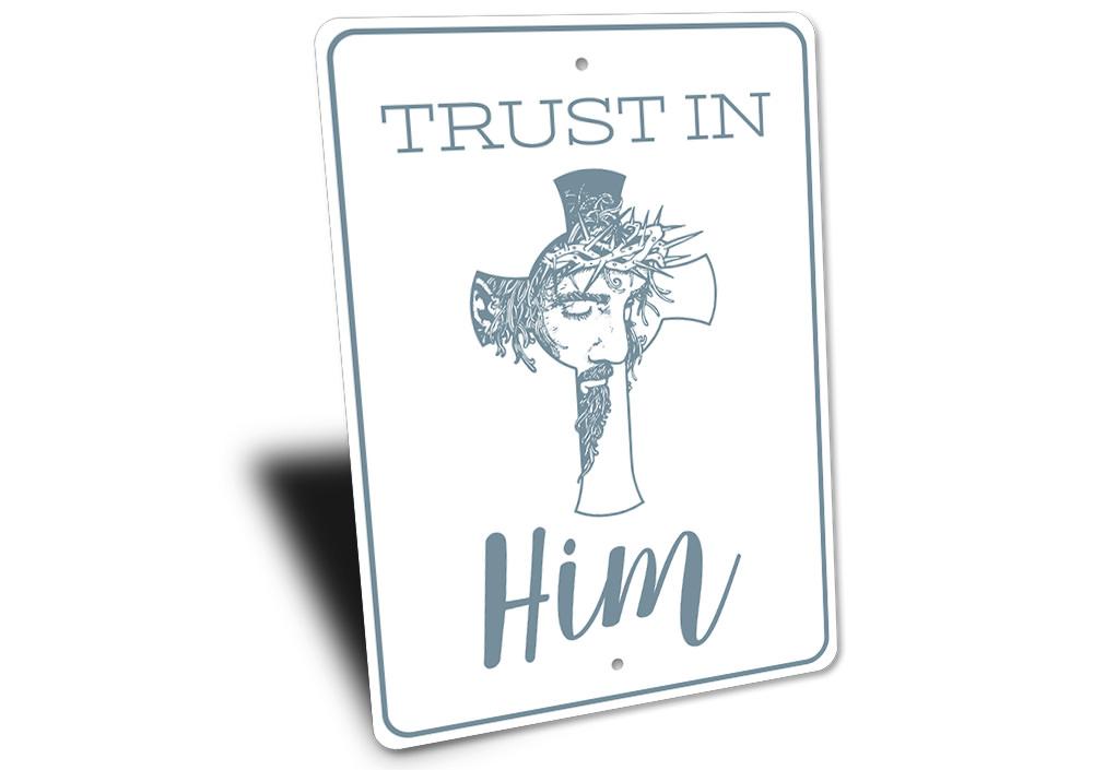 Trust in Him Sign made of high-quality aluminum, featuring inspirational text and a decorative design, perfect for home decor.