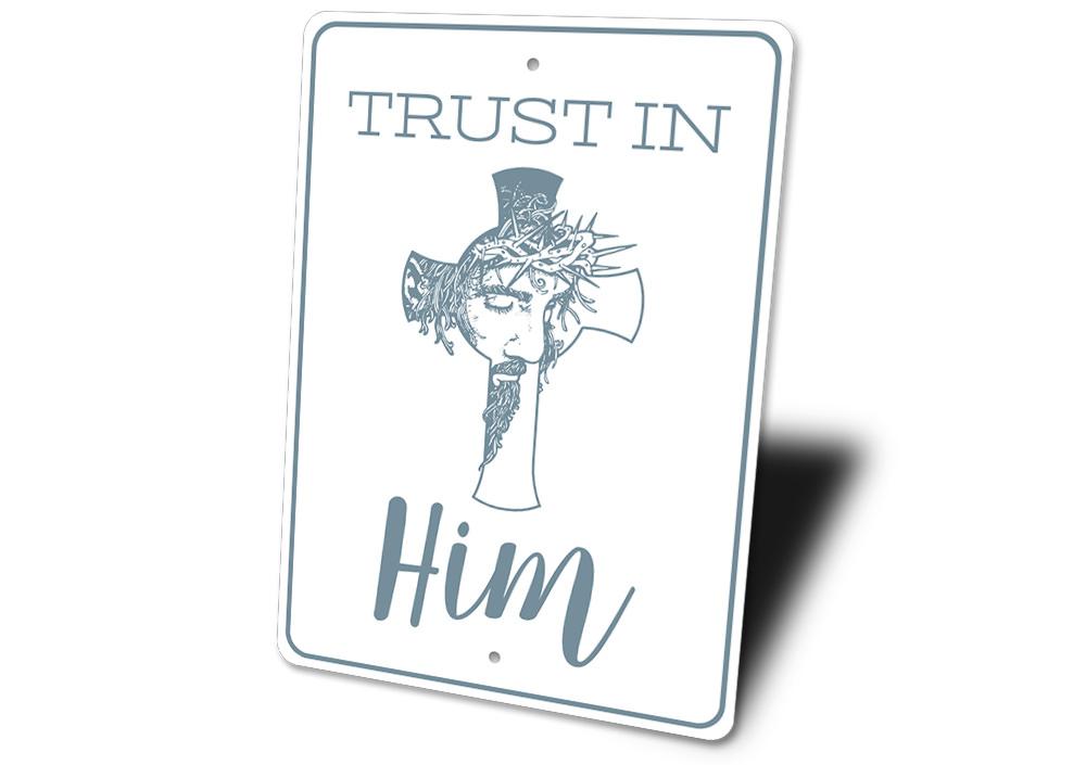 Trust in Him Sign made of high-quality aluminum, featuring inspirational text and a decorative design, perfect for home decor.