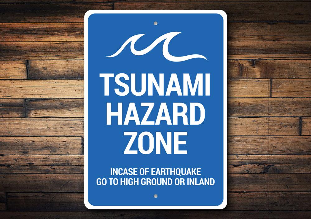 Tsunami Hazard Zone Sign made of durable aluminum, featuring clear hazard warnings and a coastal design, suitable for indoor and outdoor use.