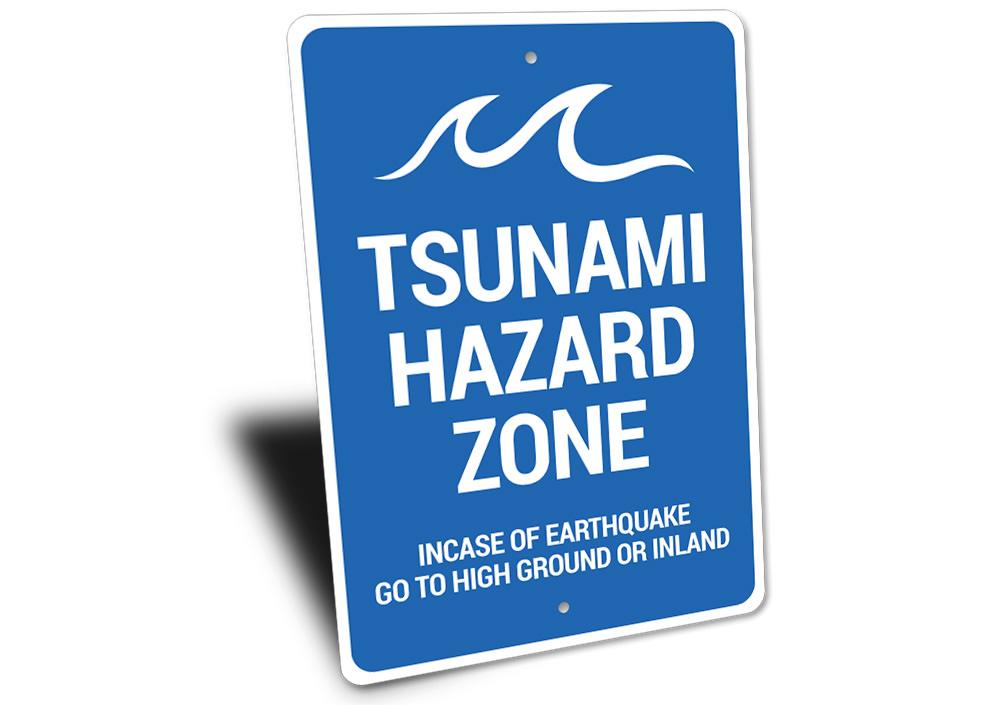 Tsunami Hazard Zone Sign made of durable aluminum, featuring clear hazard warnings and a coastal design, suitable for indoor and outdoor use.