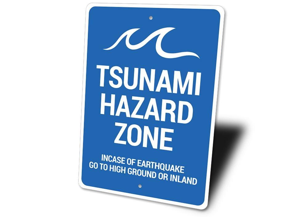 Tsunami Hazard Zone Sign made of durable aluminum, featuring clear hazard warnings and a coastal design, suitable for indoor and outdoor use.