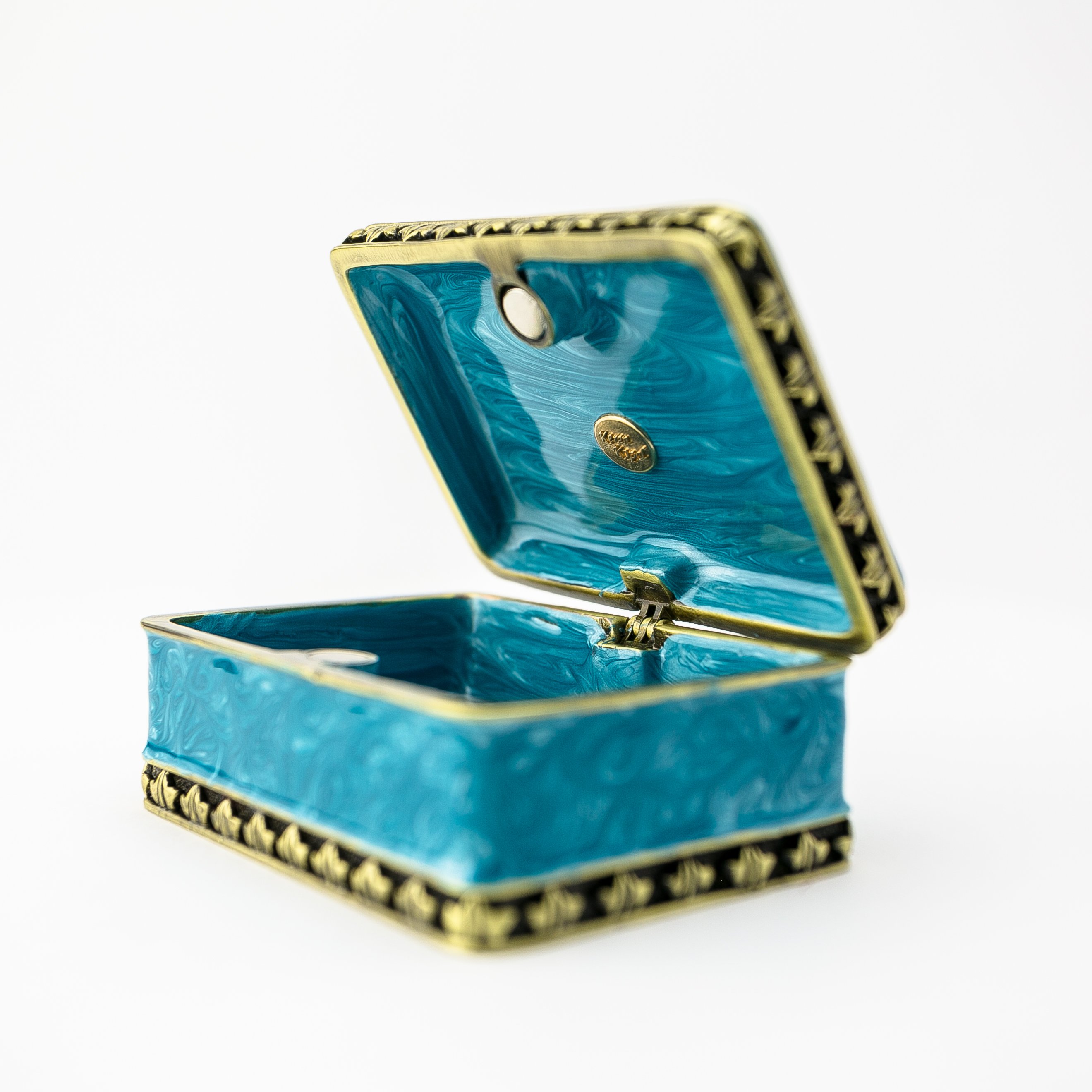 Turquoise trinket box decorated with horses and Austrian crystals, showcasing intricate enamel painting and luxurious gold or silver plating.