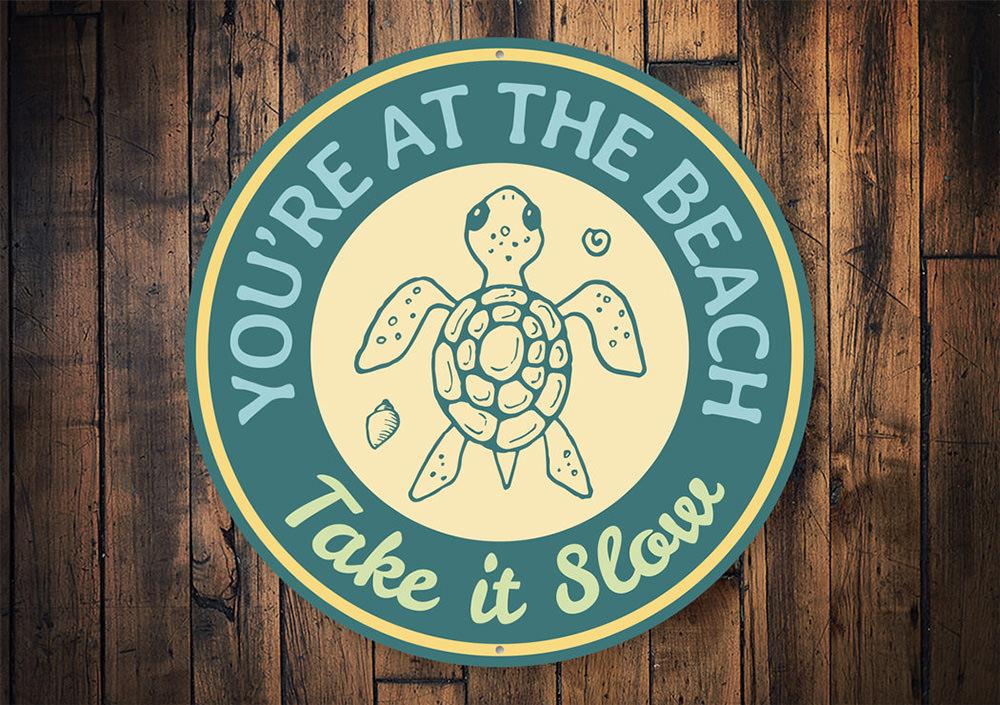 Turtle Beach Sign made of high-quality aluminum, featuring a coastal design perfect for beach houses and decor.