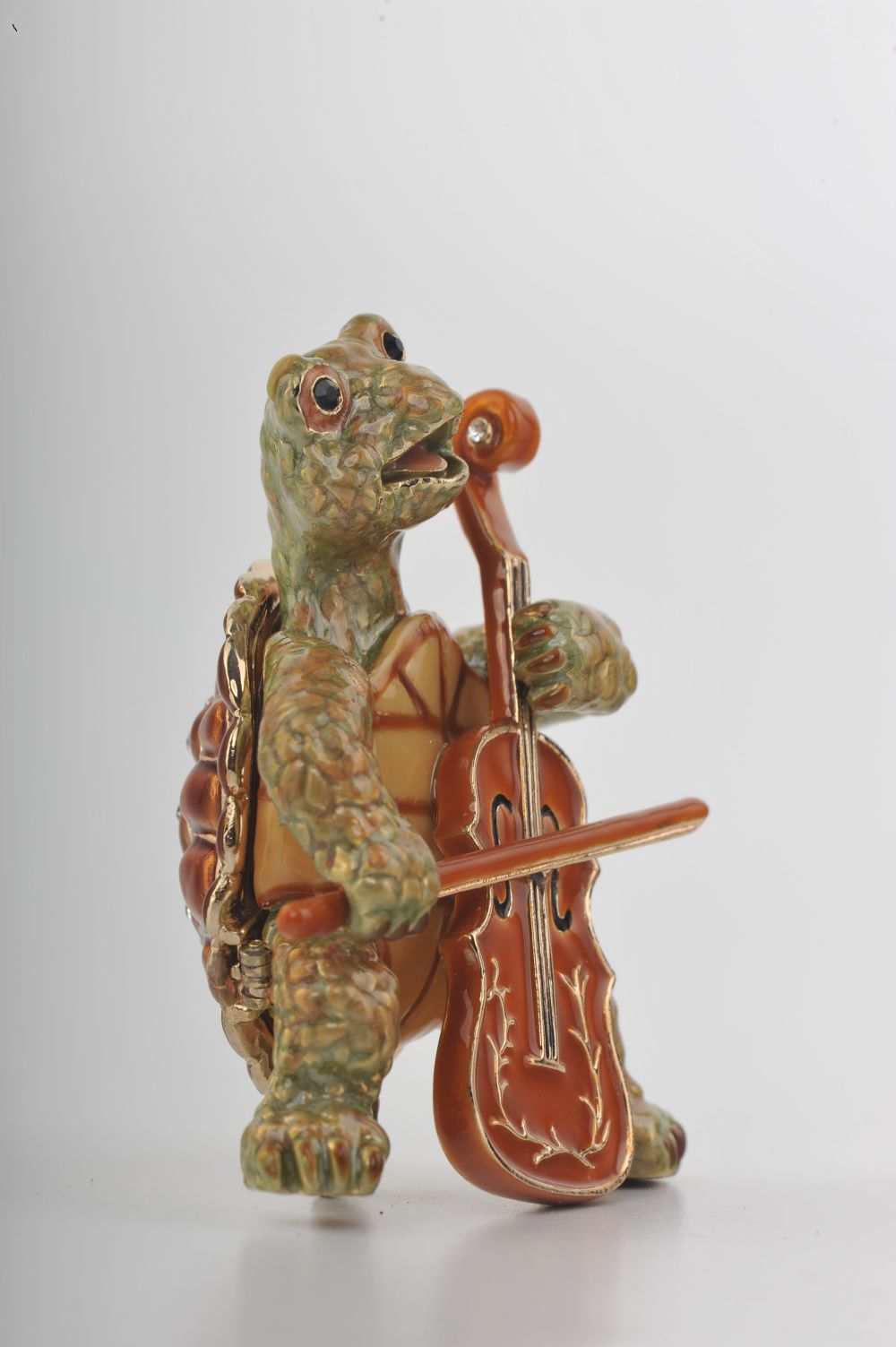 Handmade trinket box featuring a turtle playing the cello, adorned with Austrian crystals and 24K gold plating.