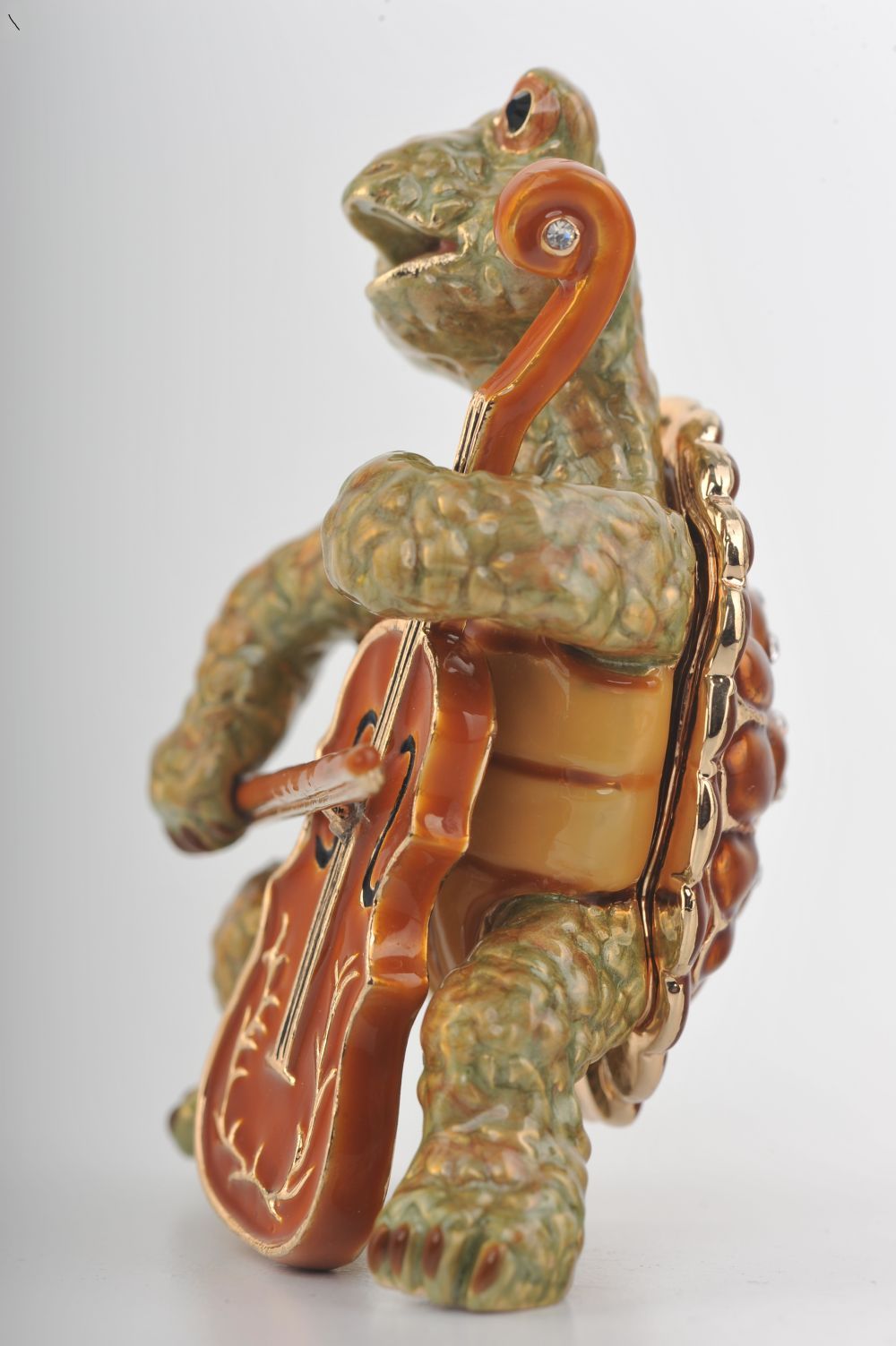 Handmade trinket box featuring a turtle playing the cello, adorned with Austrian crystals and 24K gold plating.