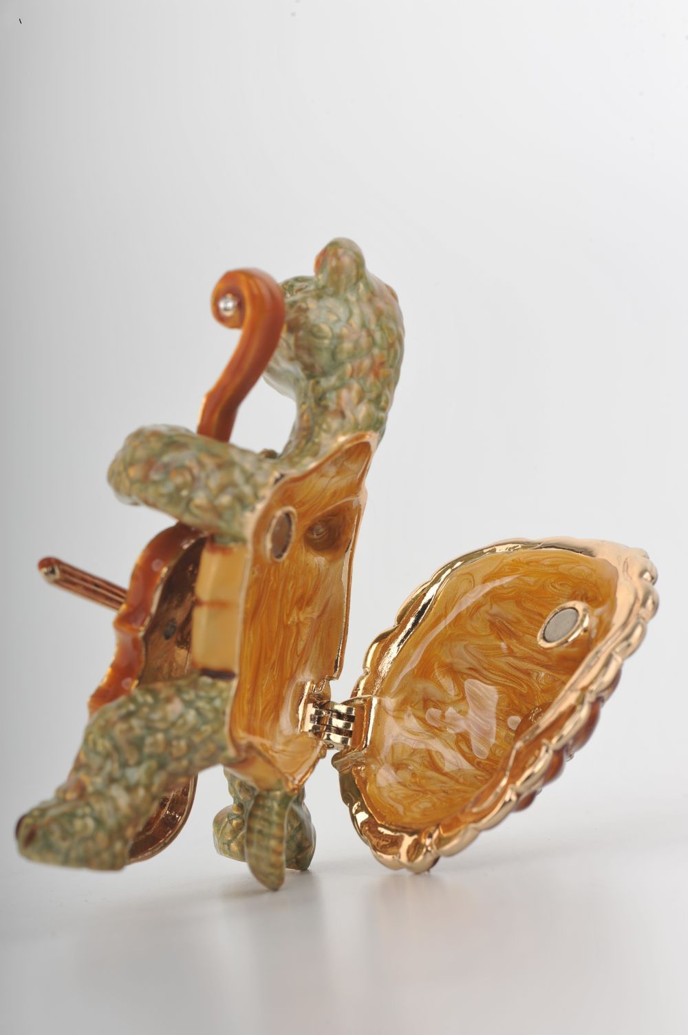 Handmade trinket box featuring a turtle playing the cello, adorned with Austrian crystals and 24K gold plating.