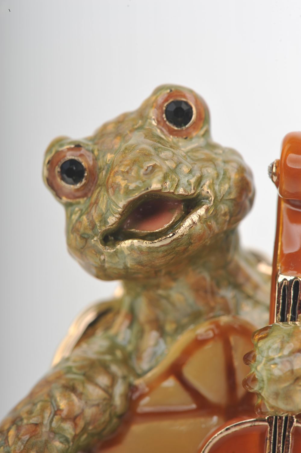 Handmade trinket box featuring a turtle playing the cello, adorned with Austrian crystals and 24K gold plating.