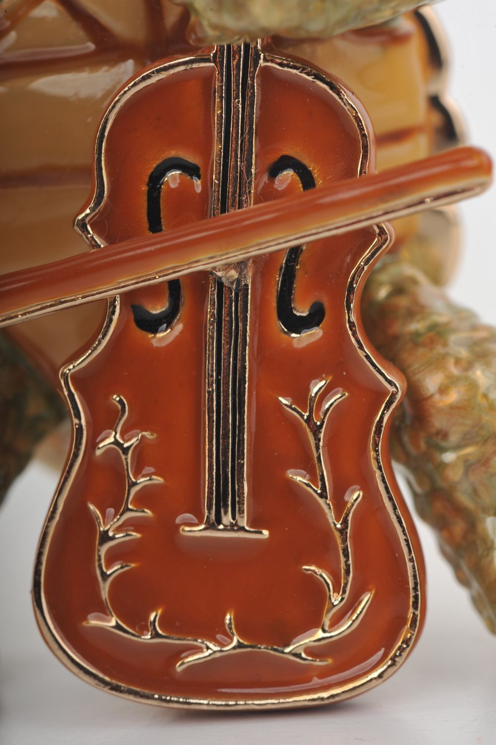 Handmade trinket box featuring a turtle playing the cello, adorned with Austrian crystals and 24K gold plating.