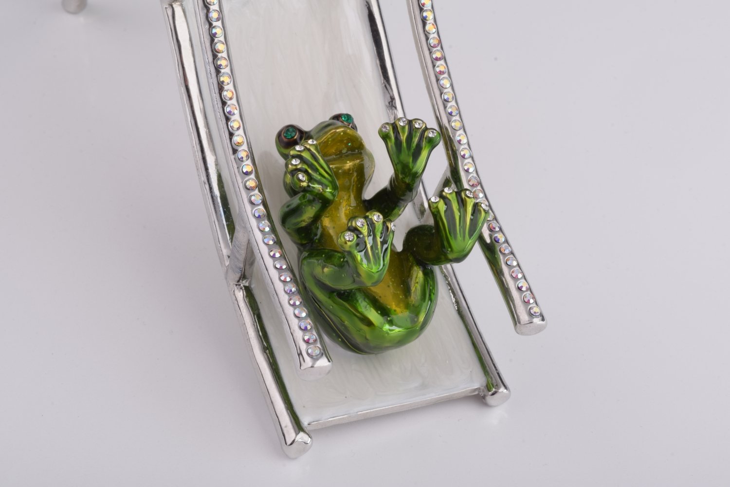 Handmade Two Frogs Riding Slide trinket box with enamel finish and Austrian crystals, plated in 24K gold.