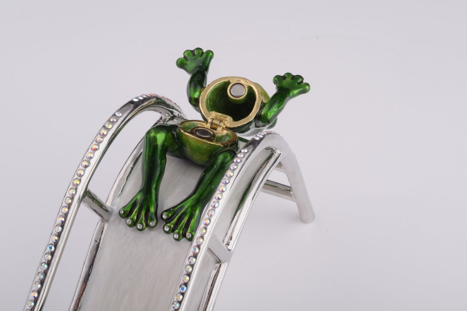 Handmade Two Frogs Riding Slide trinket box with enamel finish and Austrian crystals, plated in 24K gold.