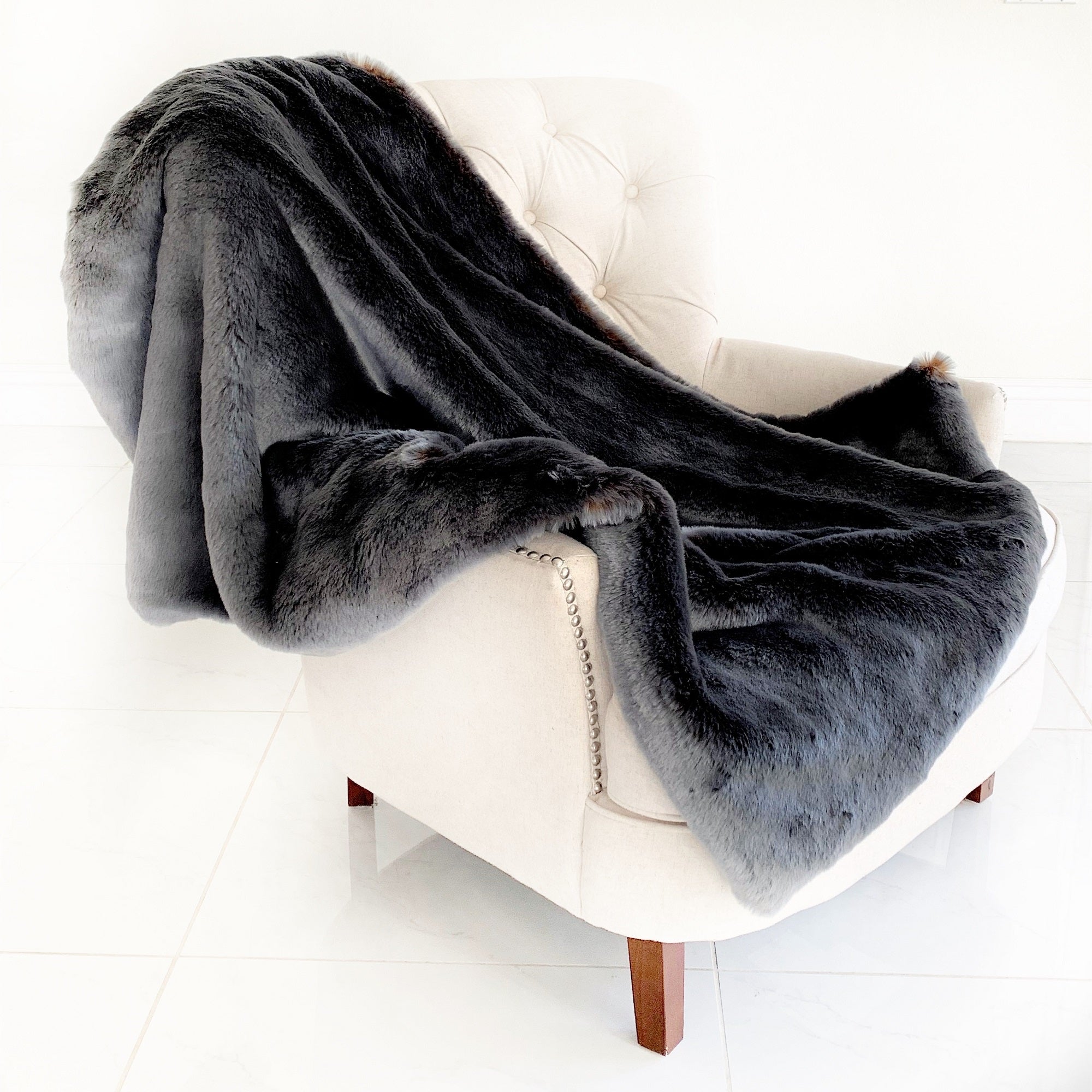 Two Tone Gray and Amber Handmade Luxury Throw showcasing plush faux fur texture and reversible design.