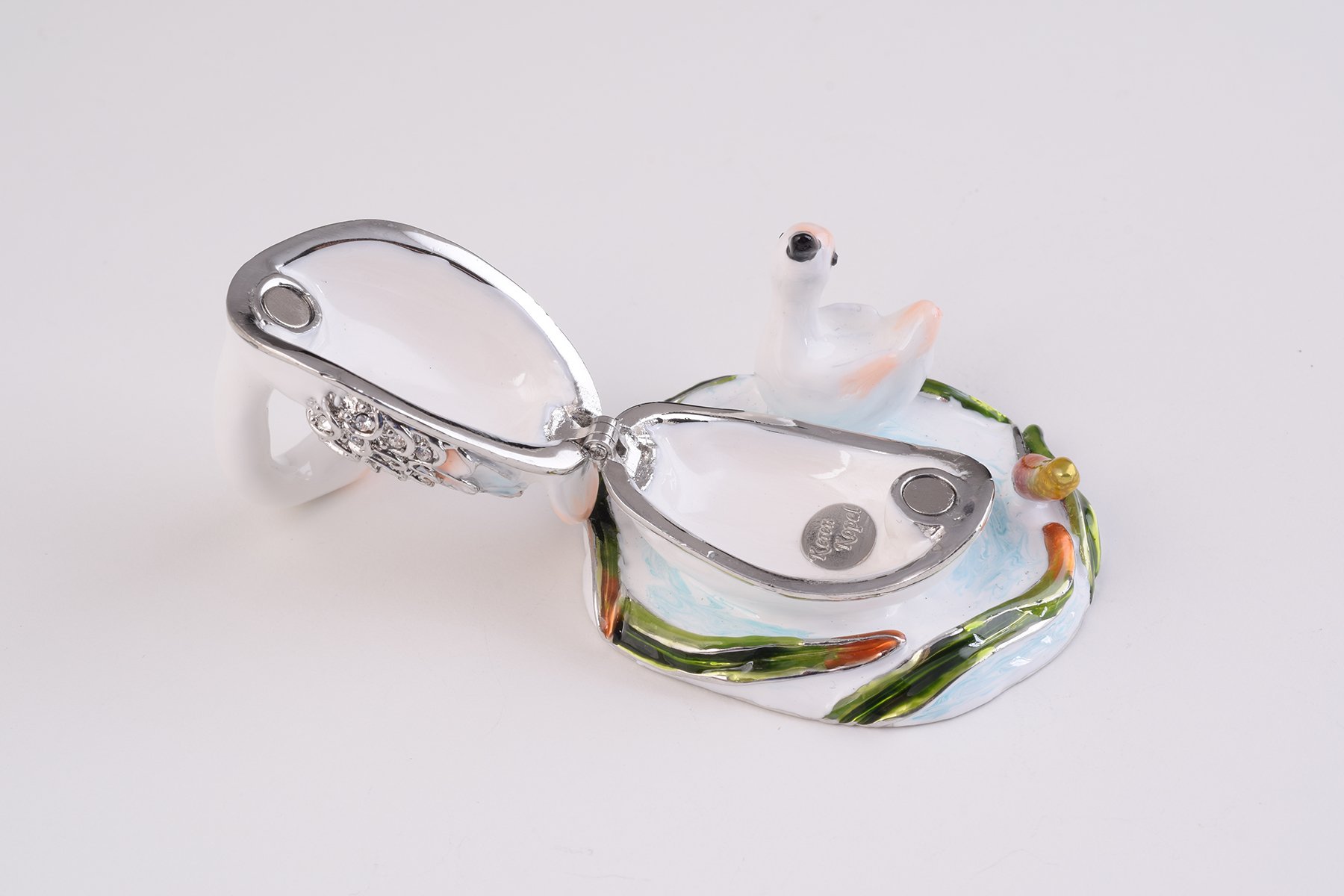 Two White Swans trinket box, handcrafted with enamel and adorned with Austrian crystals, featuring a secure magnetic closure.