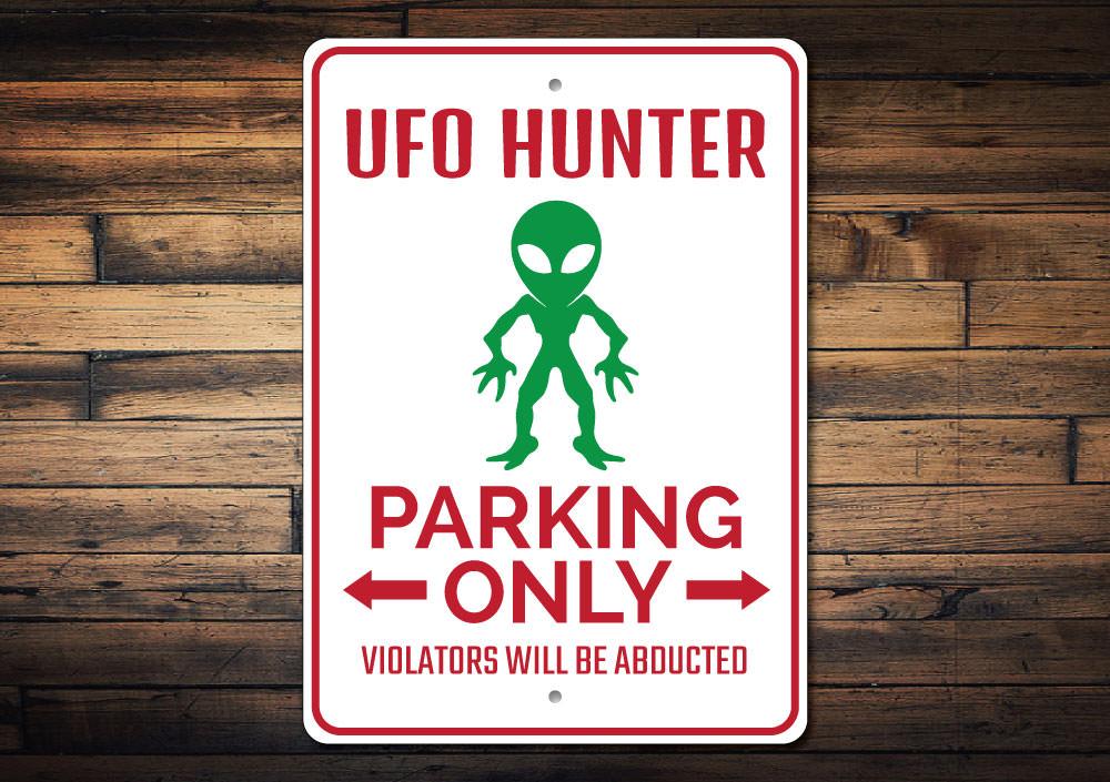 UFO Hunter Parking Sign made of durable aluminum with customizable text options, featuring a unique design for reserved parking.