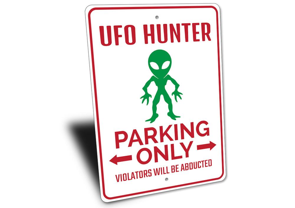 UFO Hunter Parking Sign made of durable aluminum with customizable text options, featuring a unique design for reserved parking.