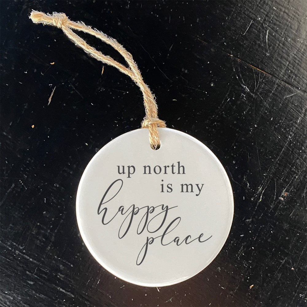 Up North is My Happy Place porcelain ornament featuring a vibrant design, measuring 2.75 inches in diameter.