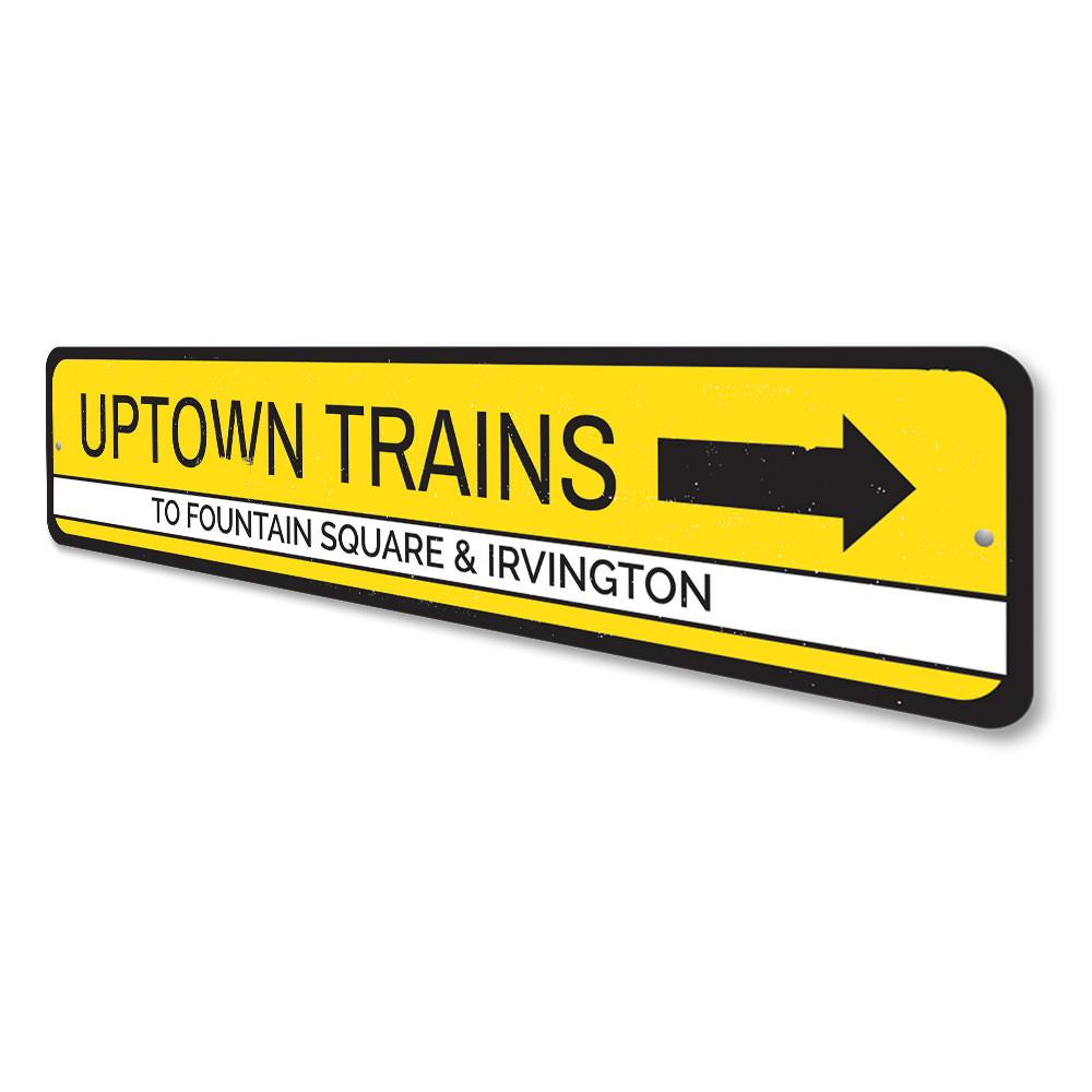 Uptown Trains Sign made of high-quality aluminum, featuring customizable text and pre-drilled holes for easy mounting.