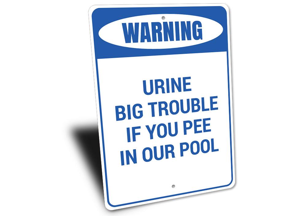 Urine Big Trouble Sign made of high-quality aluminum, featuring humorous text and a decorative design, perfect for home decor.