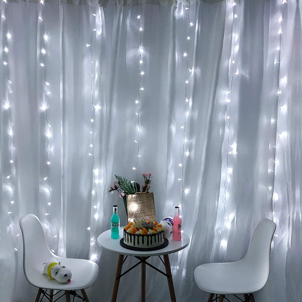 USB powered curtain fairy lights with multiple modes, perfect for bedroom and party decorations, showcasing a warm and inviting glow.