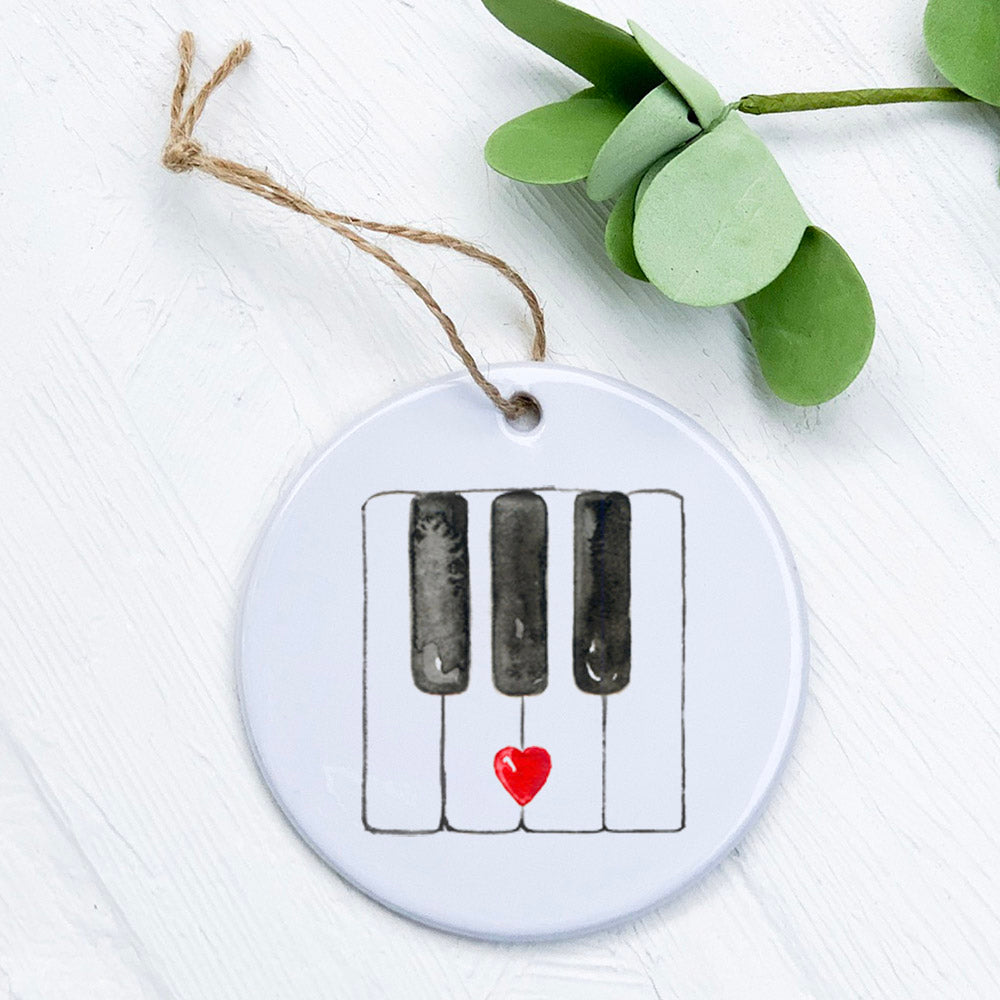 A beautifully crafted Valentine's Piano Keys ornament made of high-quality porcelain, featuring a vibrant design perfect for music lovers.