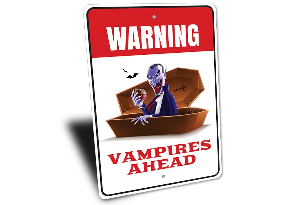 A spooky Vampire Warning Sign made of durable aluminum, featuring eerie graphics perfect for Halloween decor.