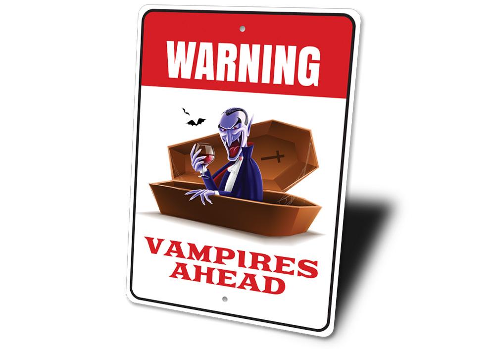 A spooky Vampire Warning Sign made of durable aluminum, featuring eerie graphics perfect for Halloween decor.