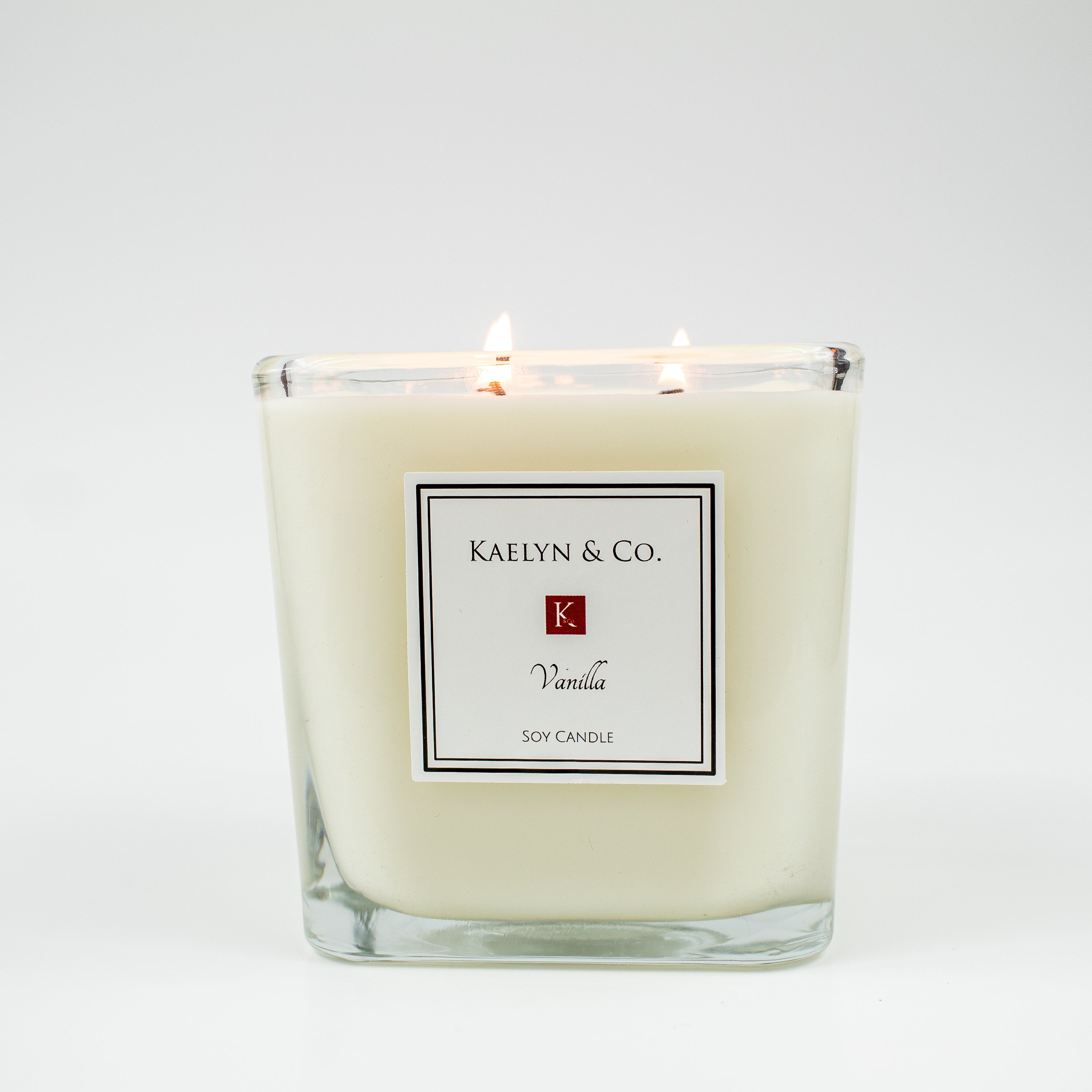 A beautifully crafted Vanilla Large Cube Candle with a creamy vanilla scent, featuring a sleek cube design and triple wicks for even burning.