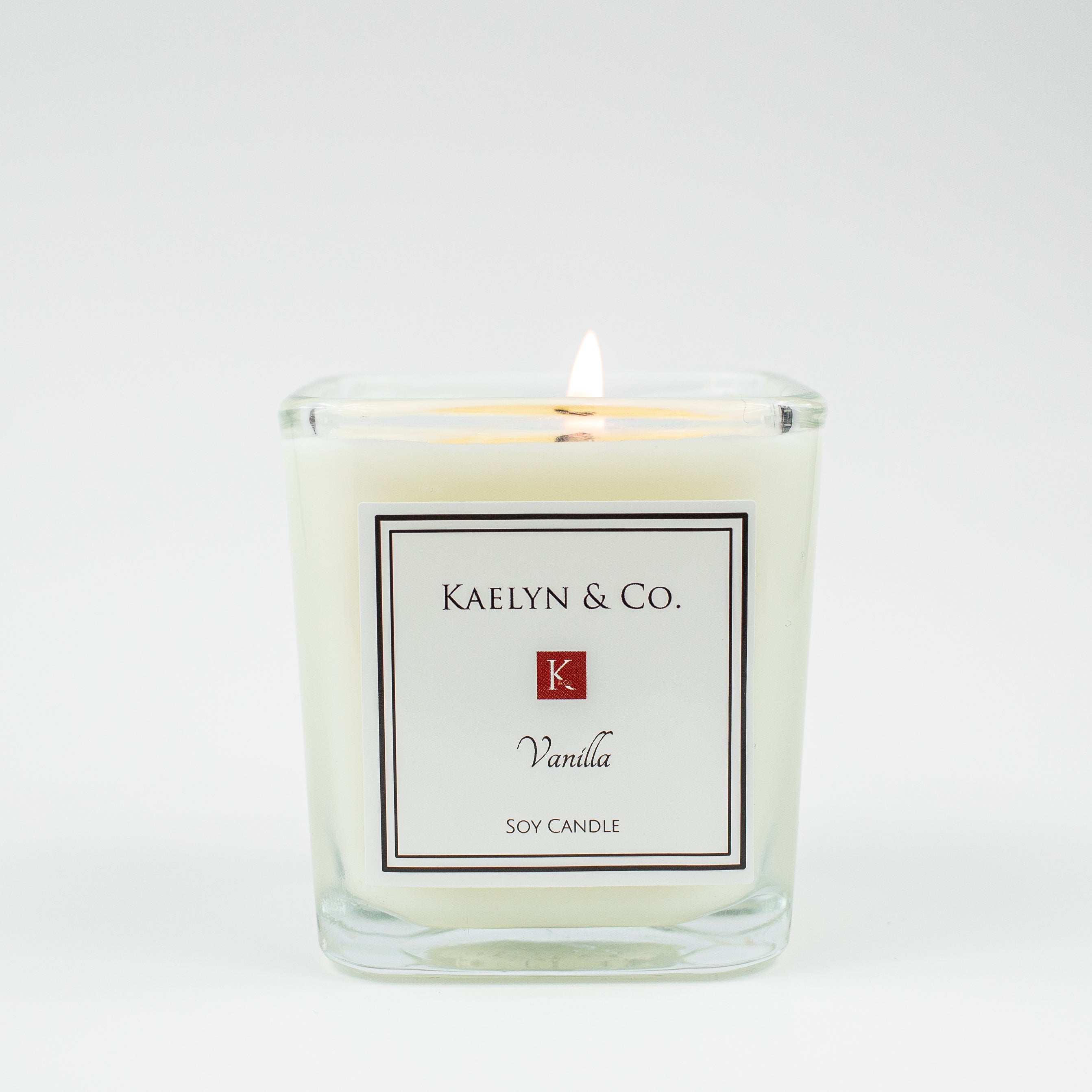 Vanilla Small Cube Candle in elegant cube shape, showcasing its creamy vanilla color and natural soy wax.