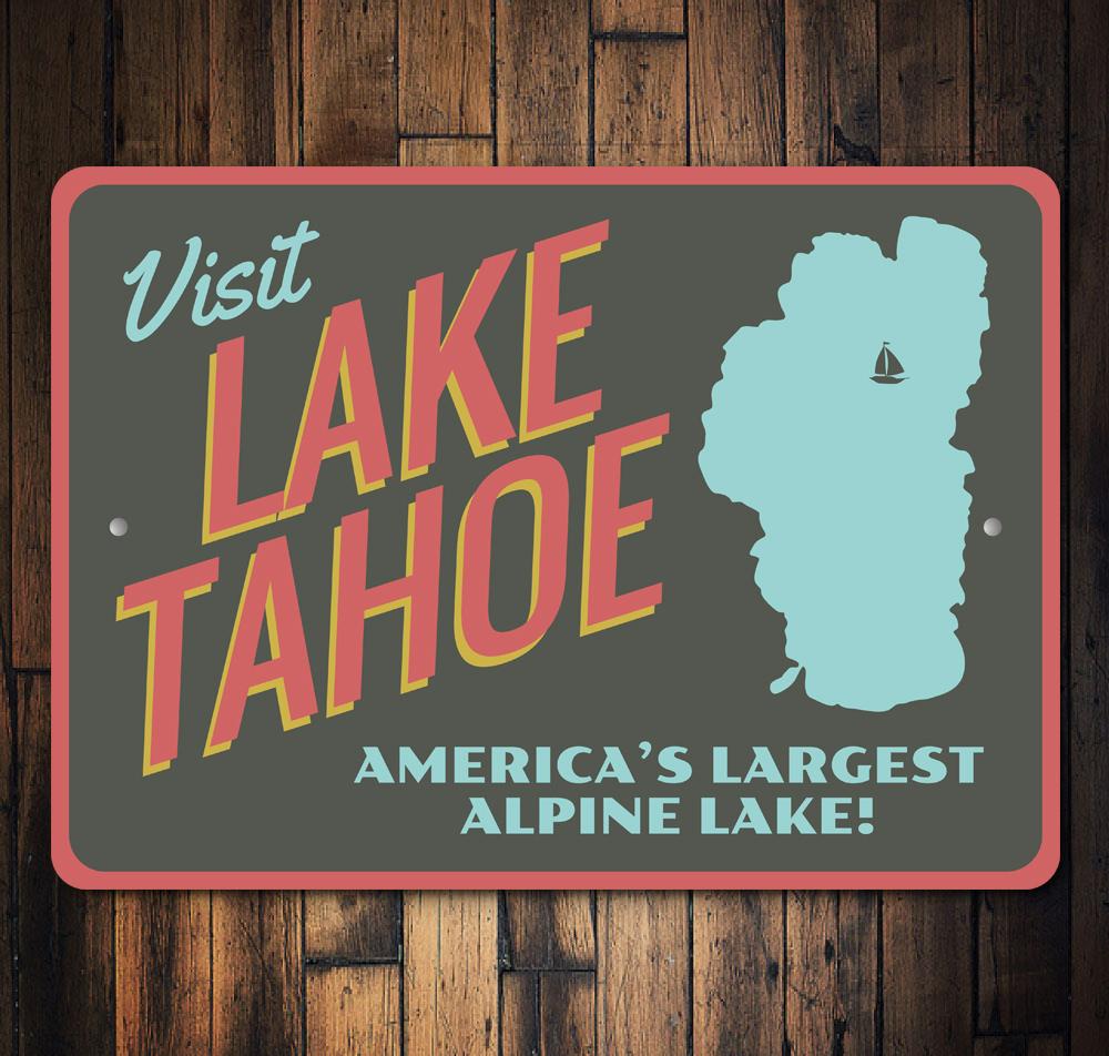 A decorative Visit Lake Tahoe sign made of high-quality aluminum, featuring customizable text and pre-drilled holes for easy mounting.