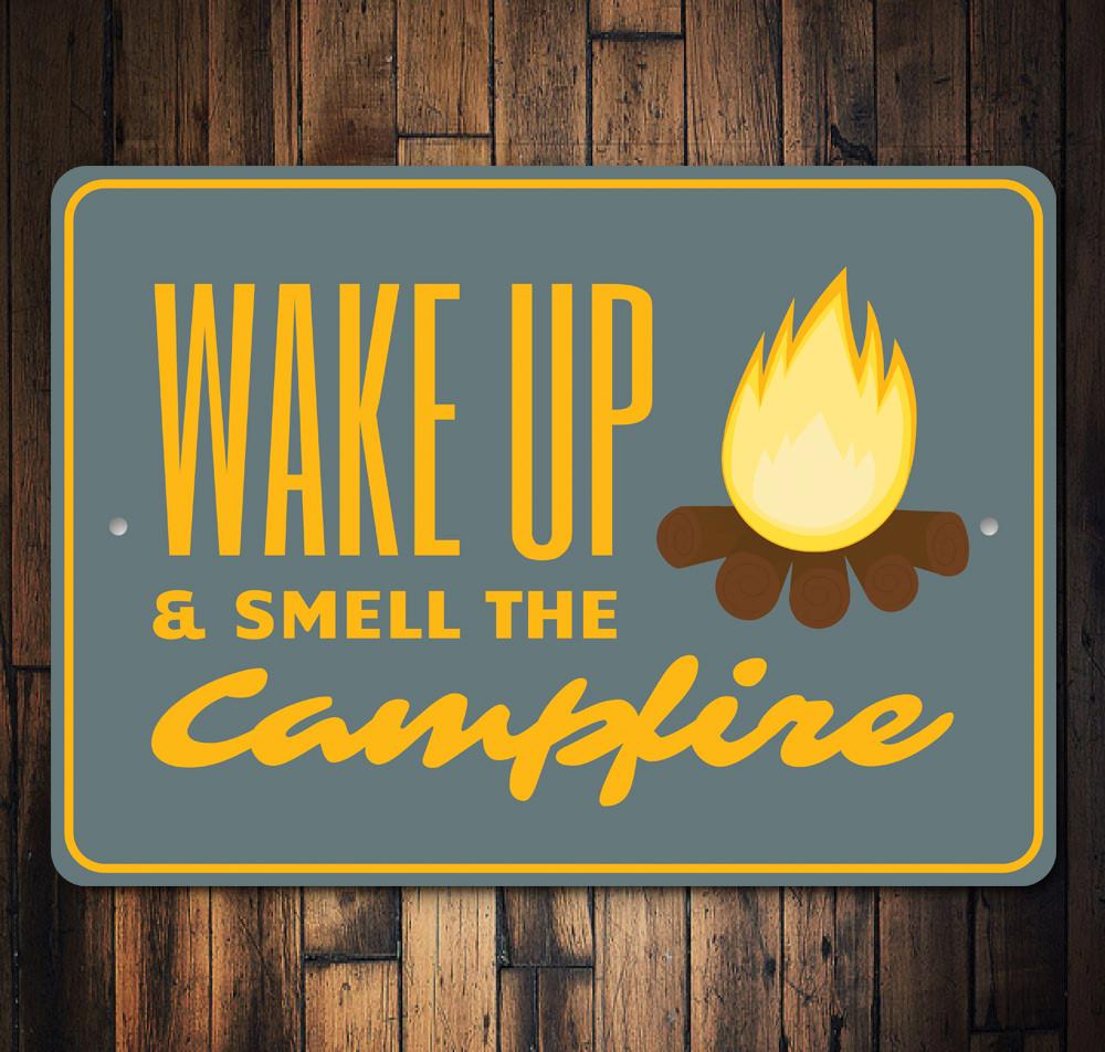 Wake Up and Smell the Campfire Sign made of high-quality aluminum, featuring a rustic design perfect for home decor.